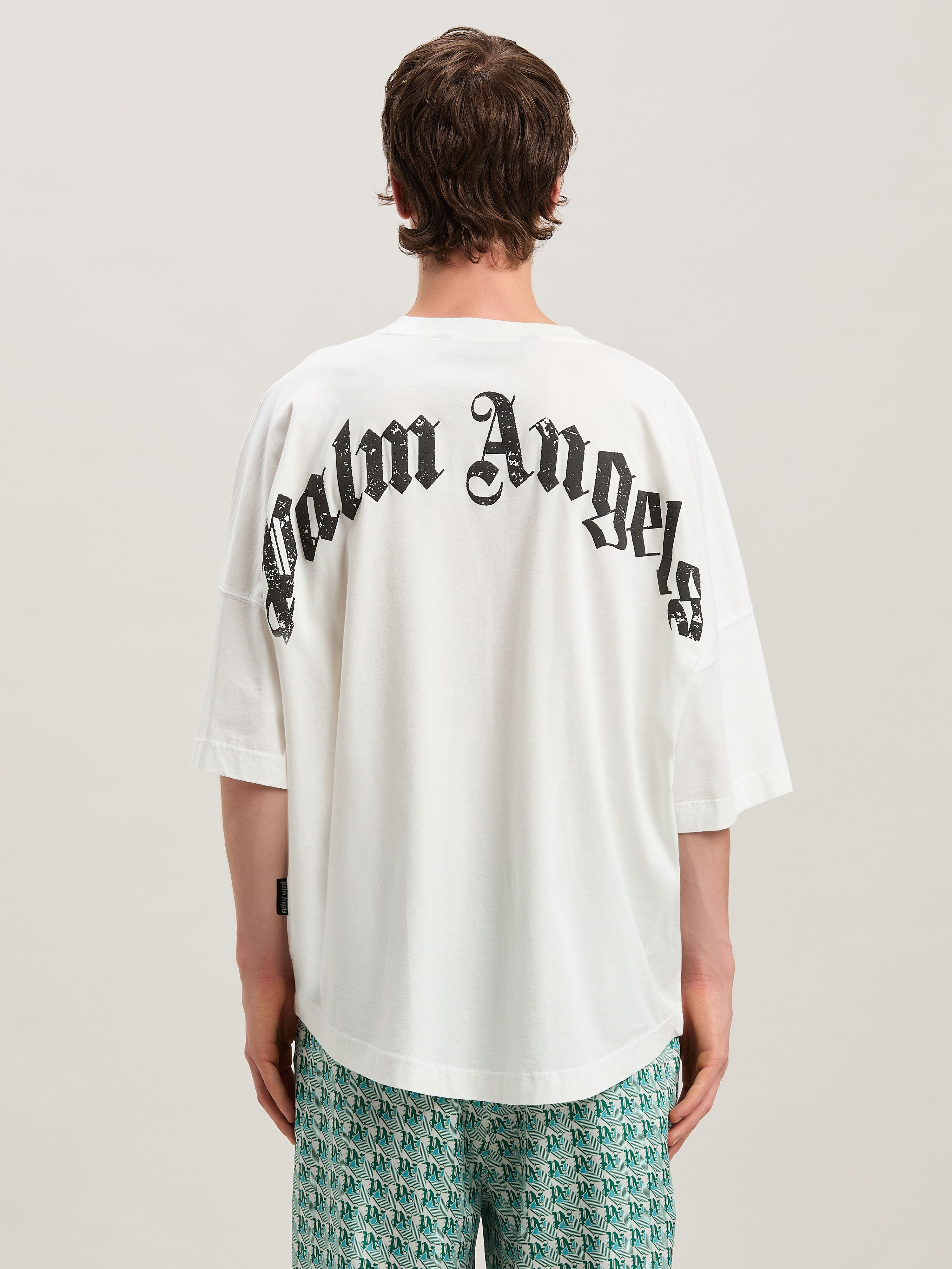 PALM ANGELS Curved logo Oversize T-shirt OFF WHITE - NERO PMAA002S25JER001