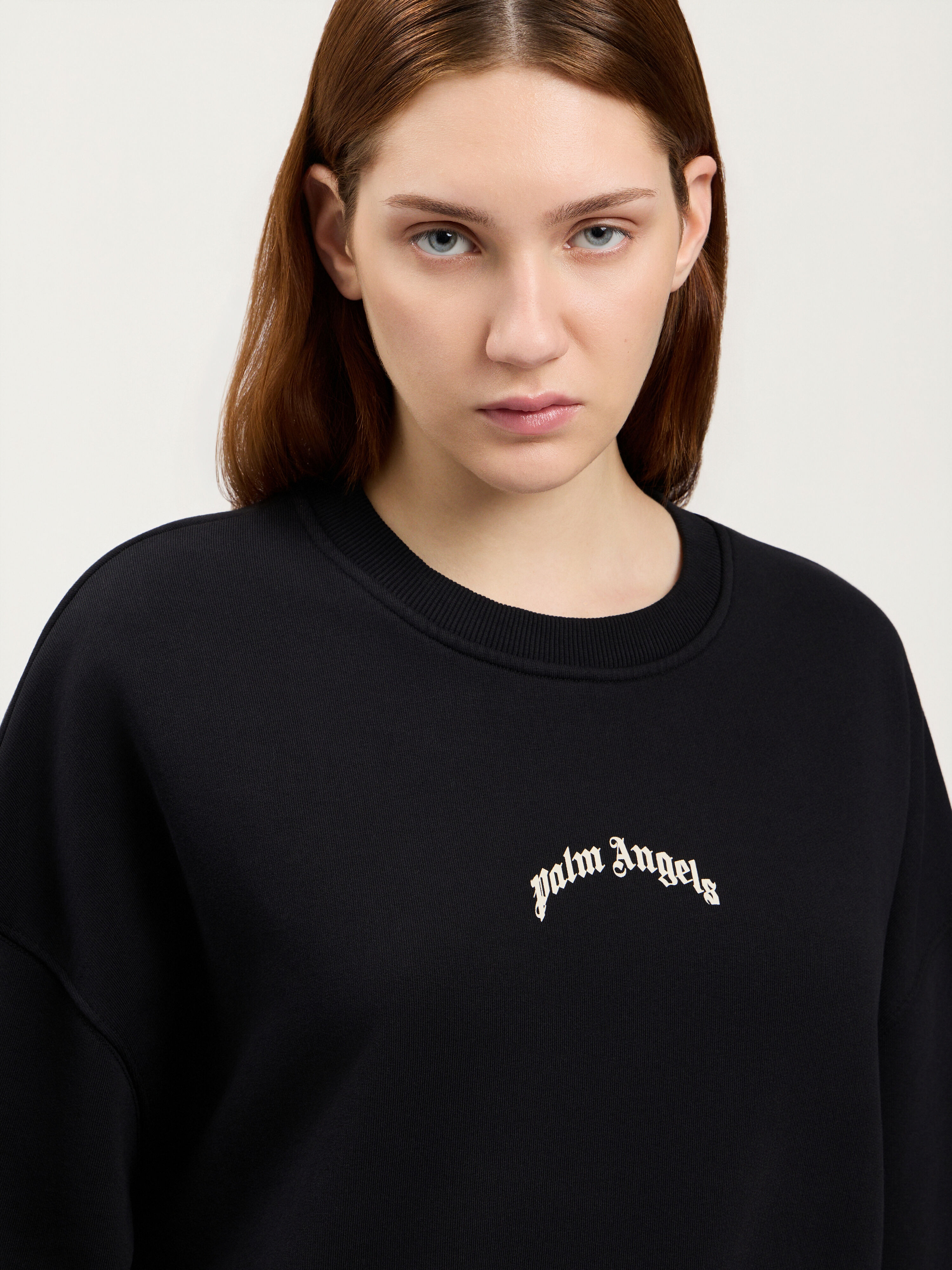 Curved Logo Crop Sweatshirt in BLACK TOFU for Women | Palm Angels®