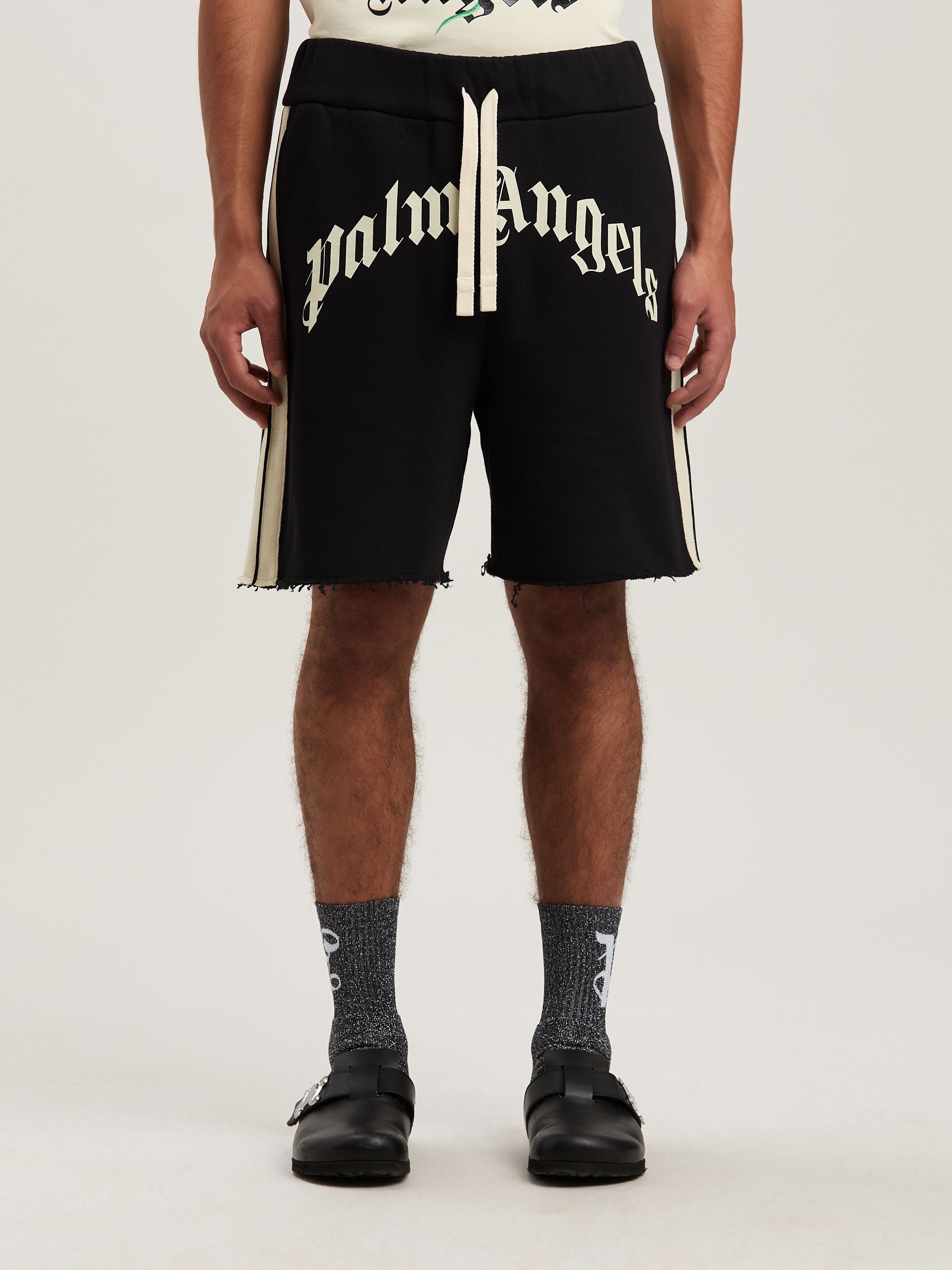 PALM ANGELS  Curved Logo Track shorts BLACK - IVORY PMCI026S25FLE001
