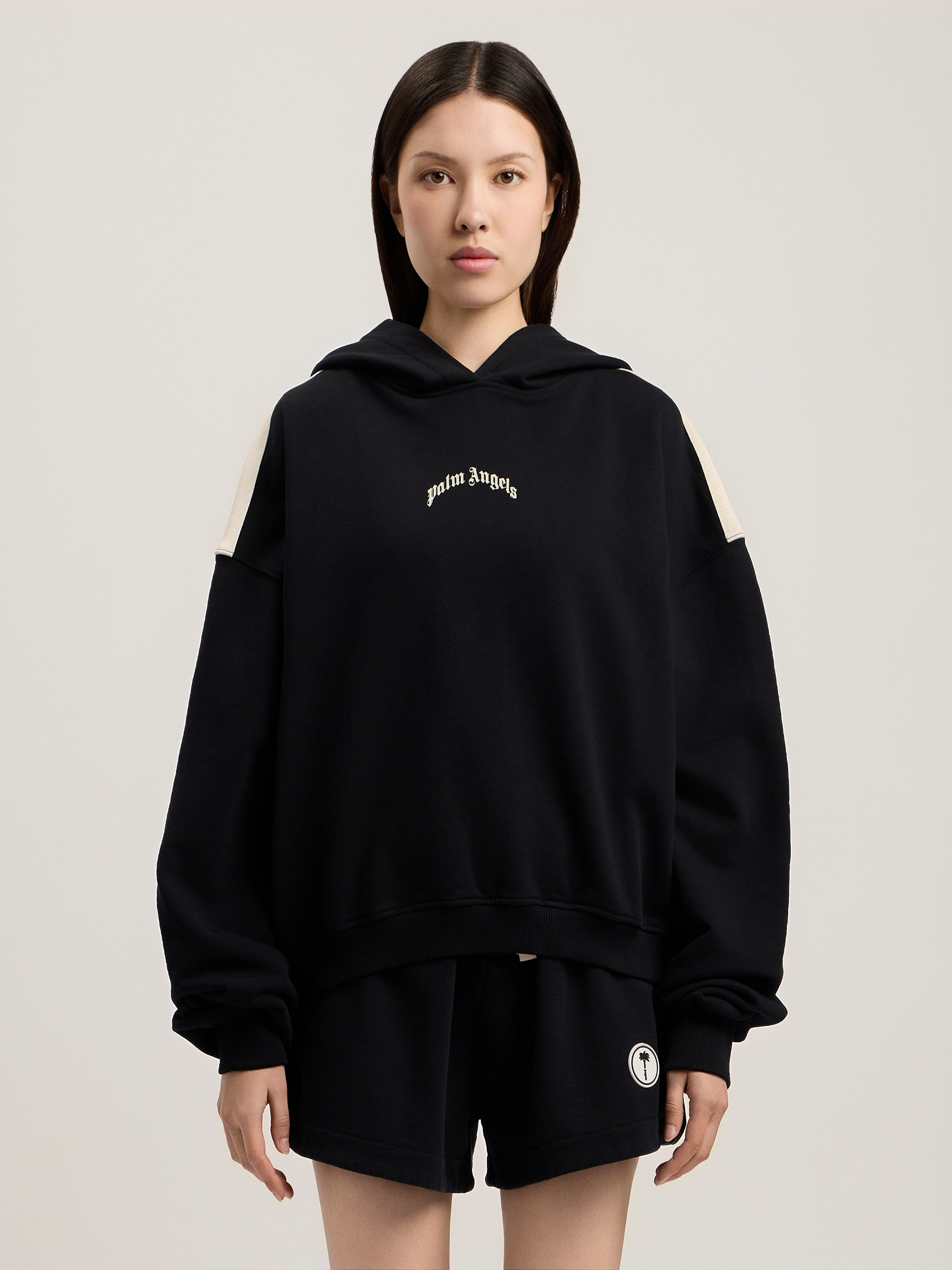 Curved Logo Loose Crop Hoodie in BLACK TOFU for Women | Palm Angels®