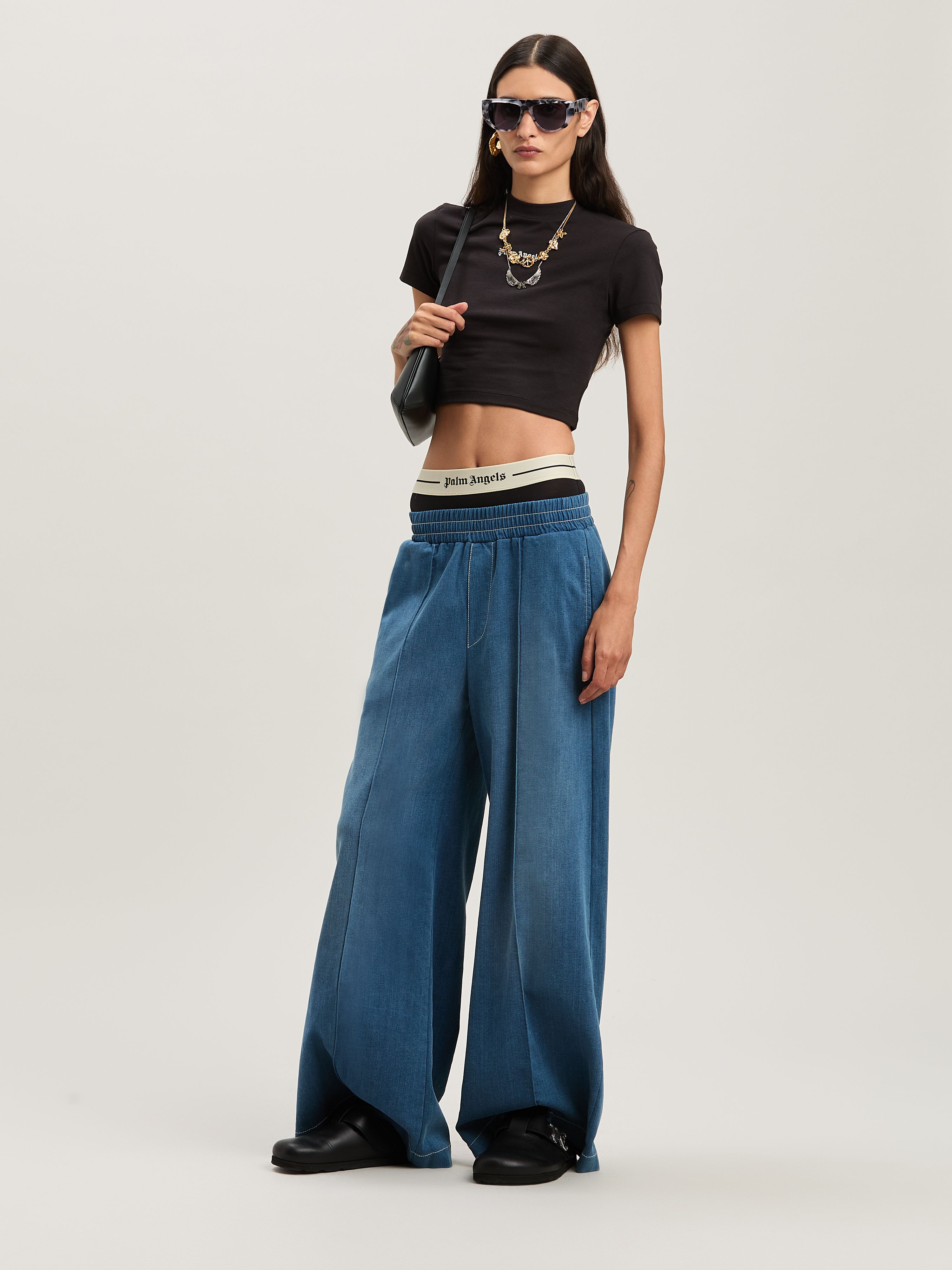 PALM ANGELS  Jogginghose mit Palme INDIGO BLUE - OFF WHITE PWCH024S25FAB001