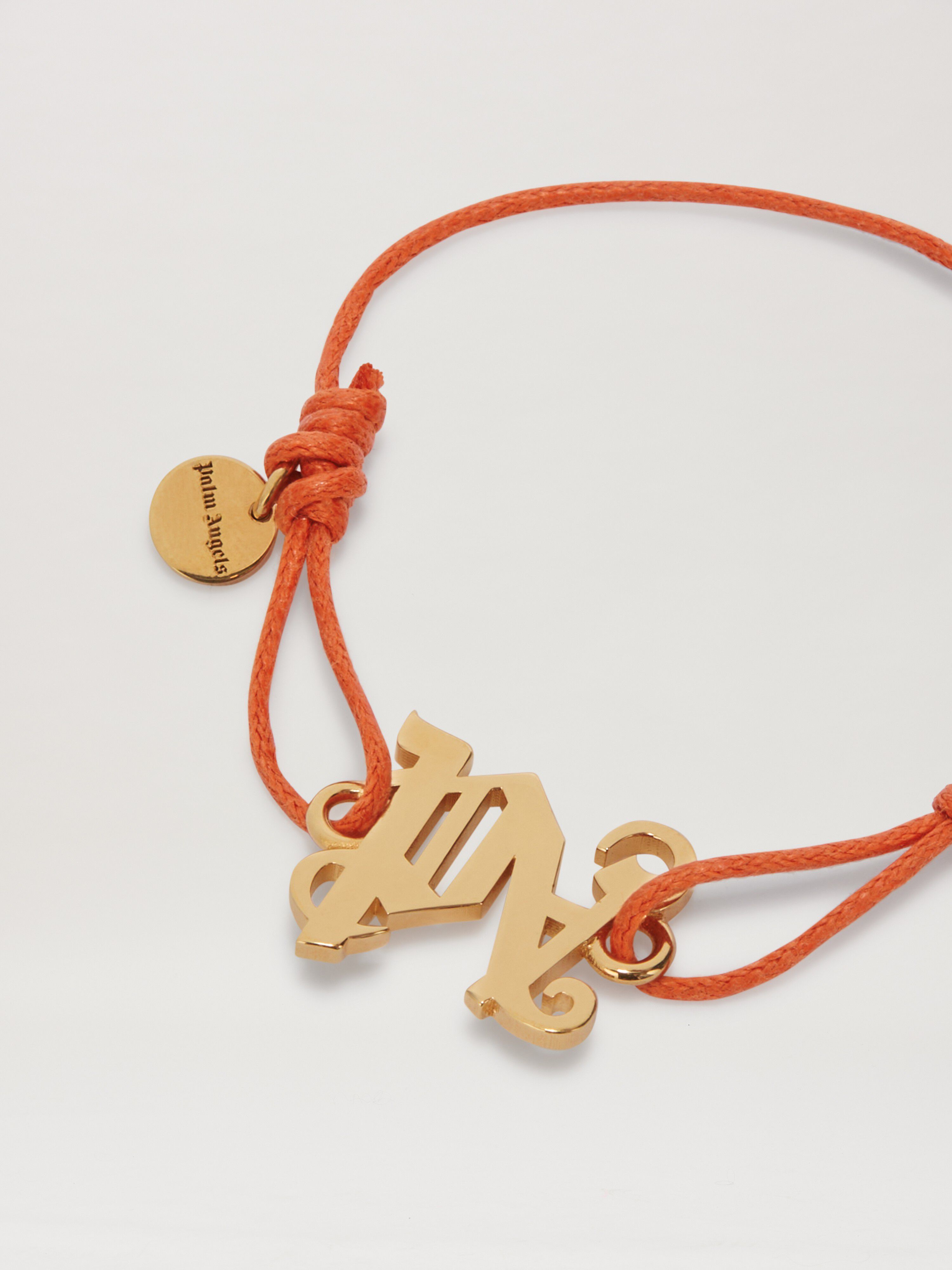PALM ANGELS  Monogram cord bracelet ORANGE - GOLD PWOA045S25MAT001