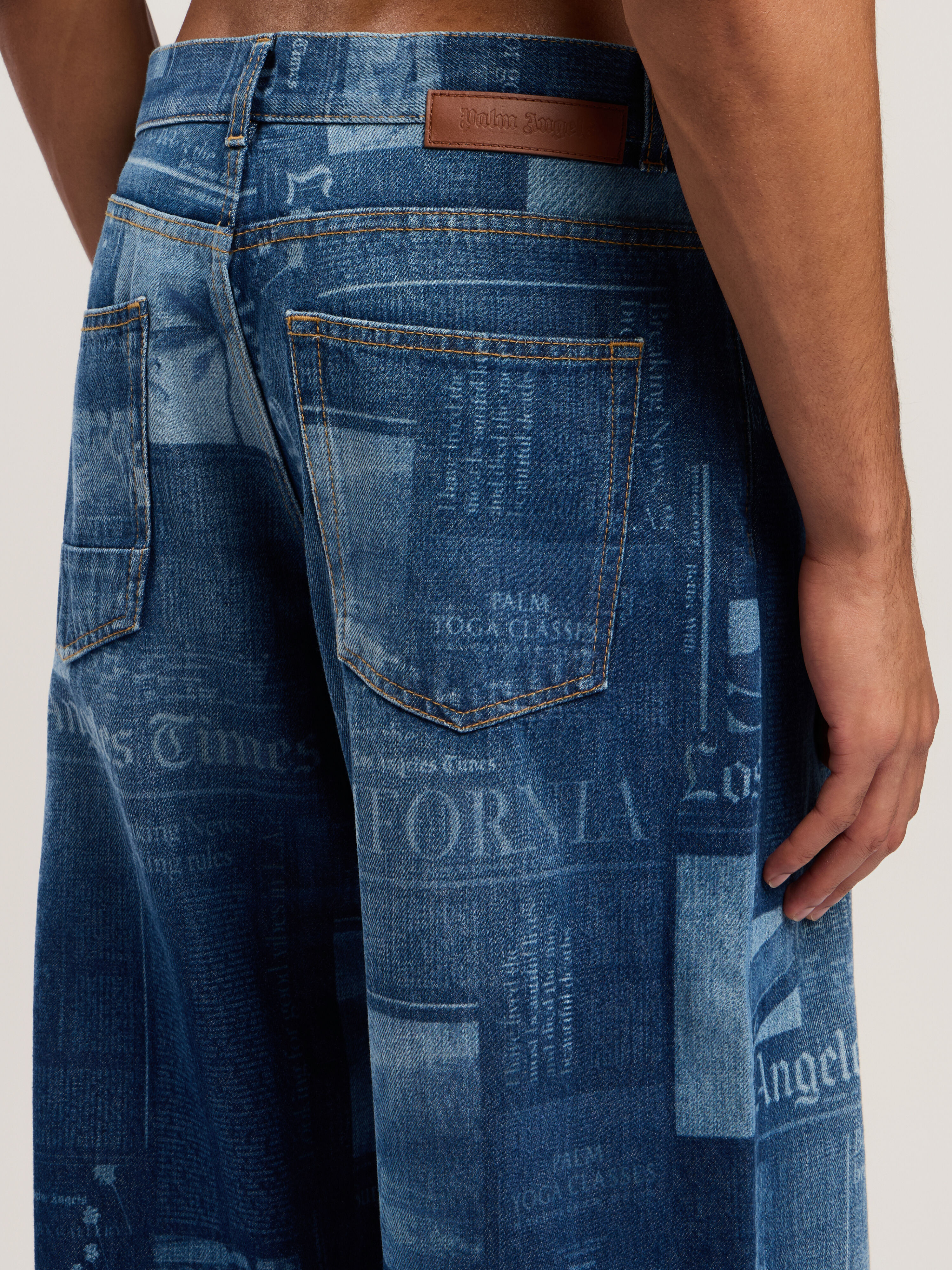 PALM ANGELS News Print Loose Denim Pants MEDIUM BLUE - DUSTY BLUE PMYA049F25DEN002