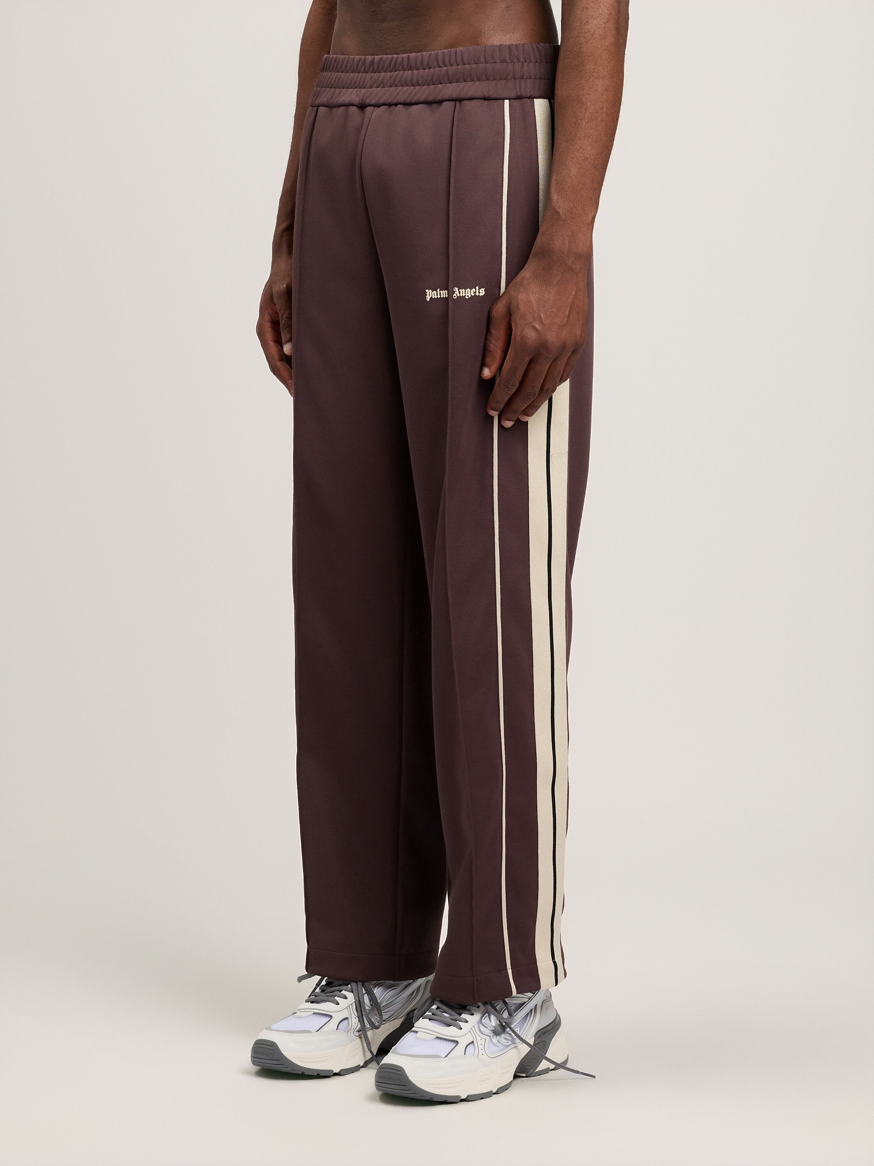 パーム・エンジェルス クラシック ロゴプリント パンツ Classic Logo Vintage Track Pants in BROWN OFF WHITE for Men | Palm