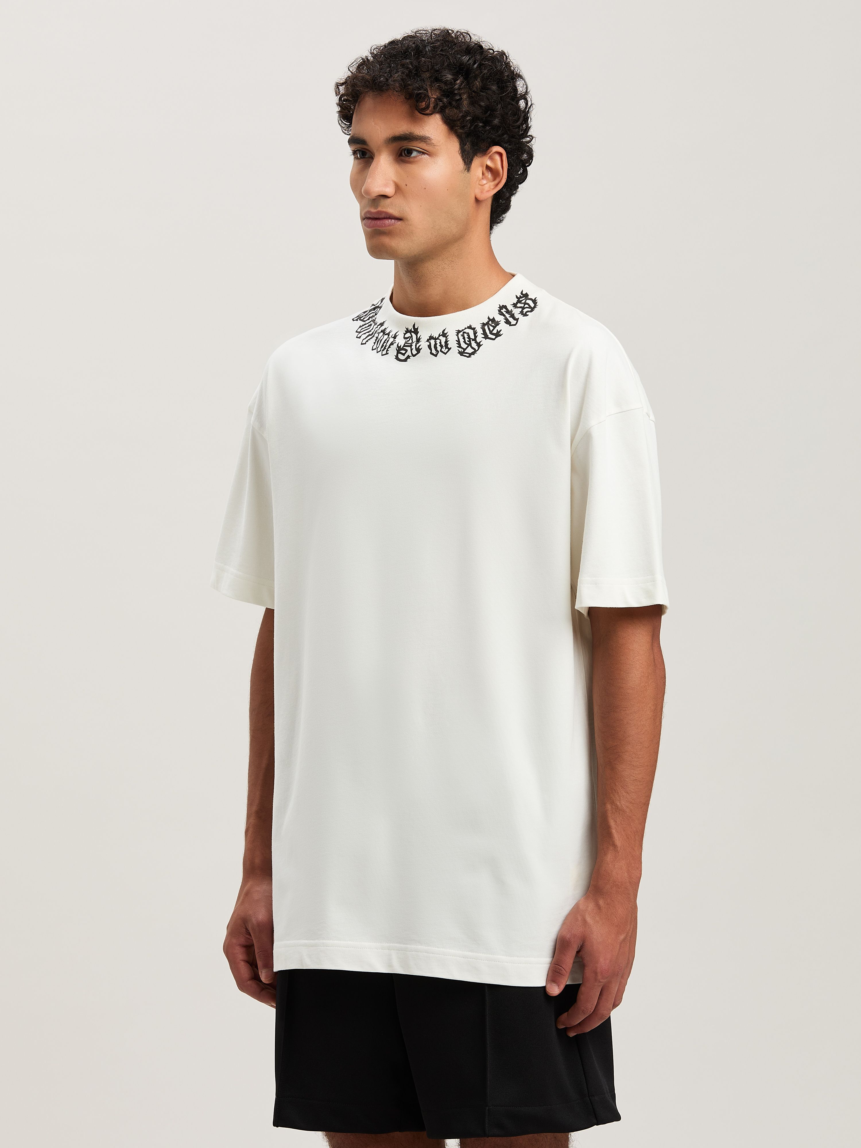 PALM ANGELS  Flame logo T-shirt OFF WHITE - BLACK PMAA001S25JER002