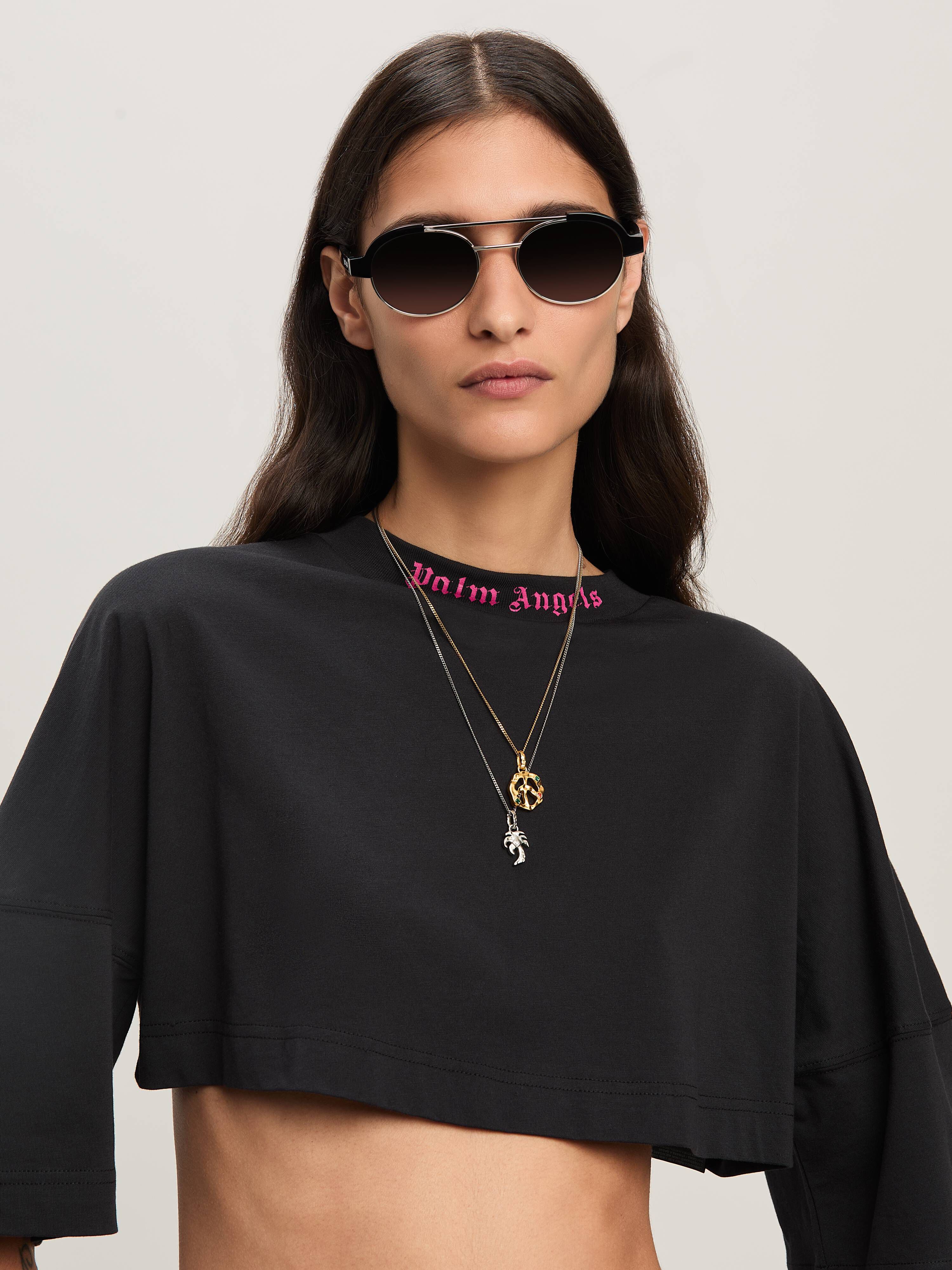 PALM ANGELS  Oversize T-Shirt mit geschwungenem Logo BLACK - FUCHSIA PWAA054S25JER001