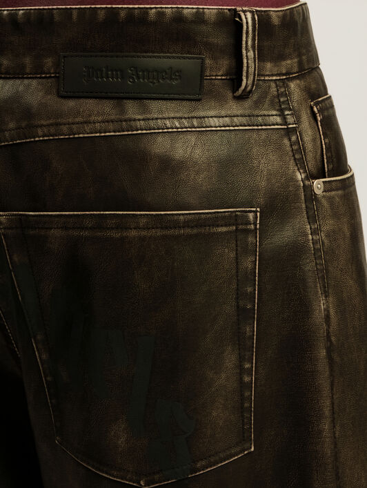 Curved Logo Coated Pants PALM ANGELS Curved Logo Coated Pants DARK GREY - BLACK PMJB018F25FAB001