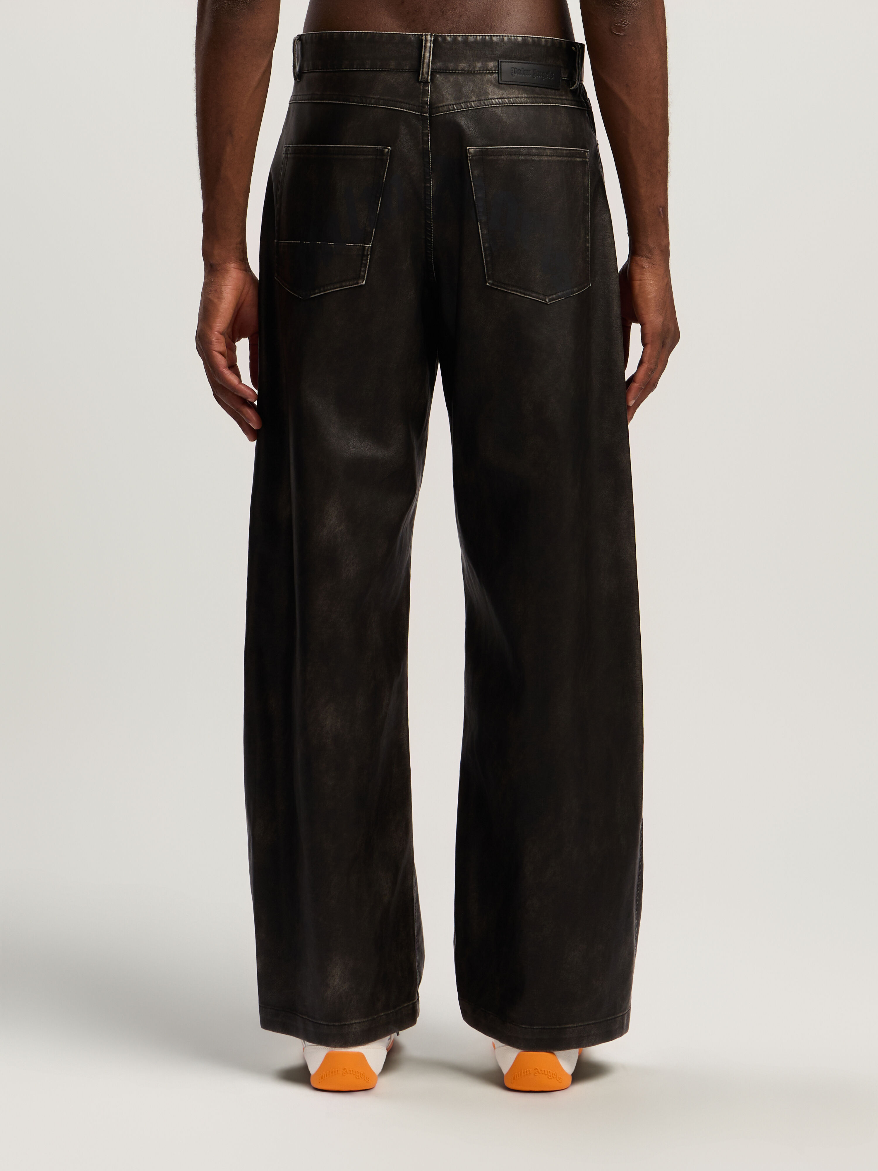 PALM ANGELS Curved Logo Coated Pants DARK GREY - BLACK PMJB018F25FAB001