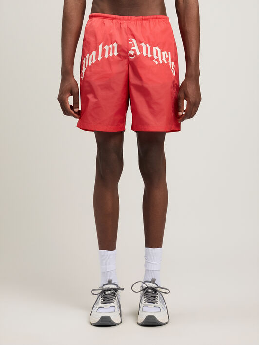 PALM ANGELS Curved Logo Swimshorts RED OFF WHITE PMFD018S26FAB001