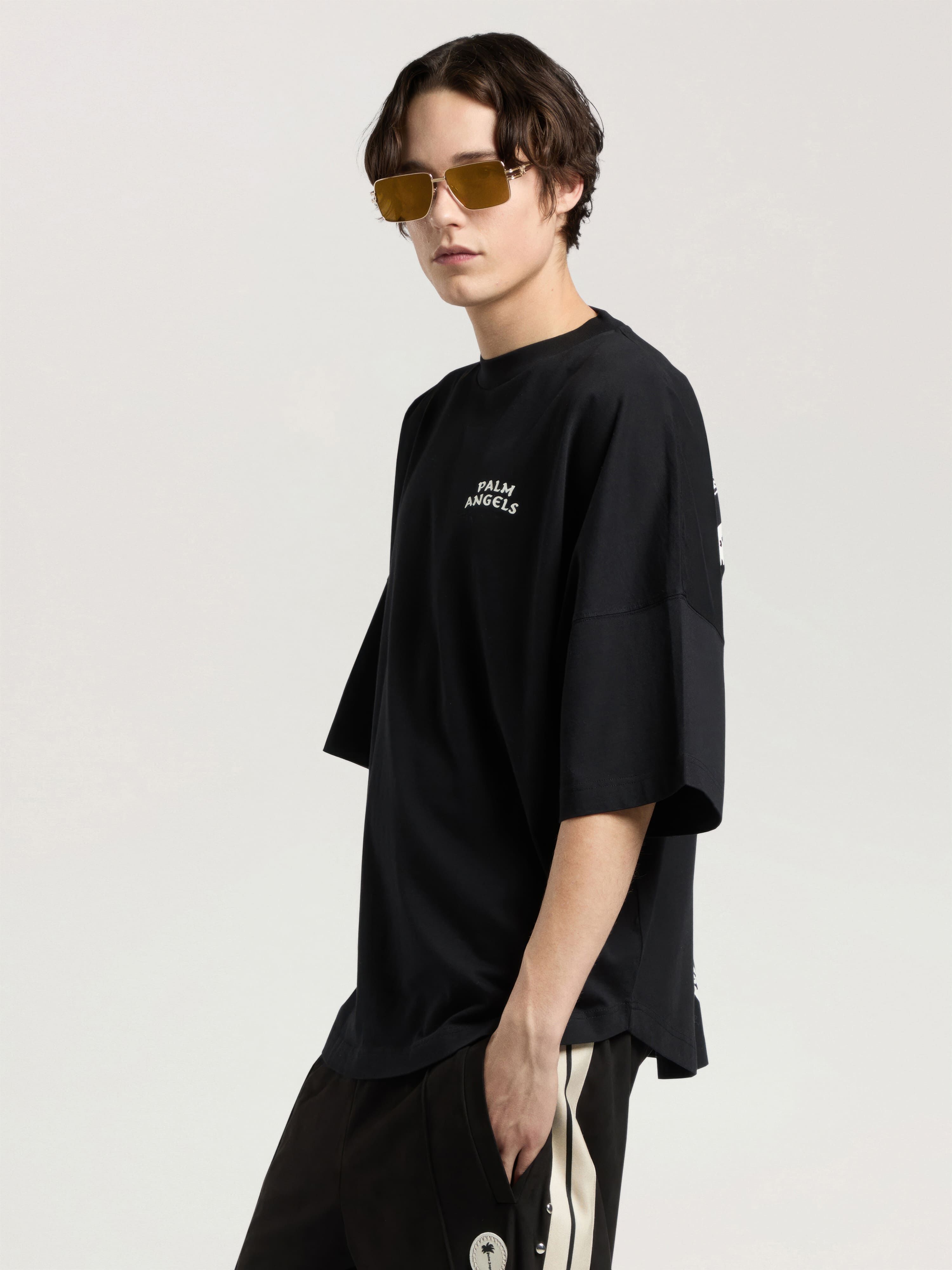Palm Drift Back Over T-Shirt PALM ANGELS Palm Drift Back Over T-Shirt BLACK - OFF WHITE PAMAA05W26JR03