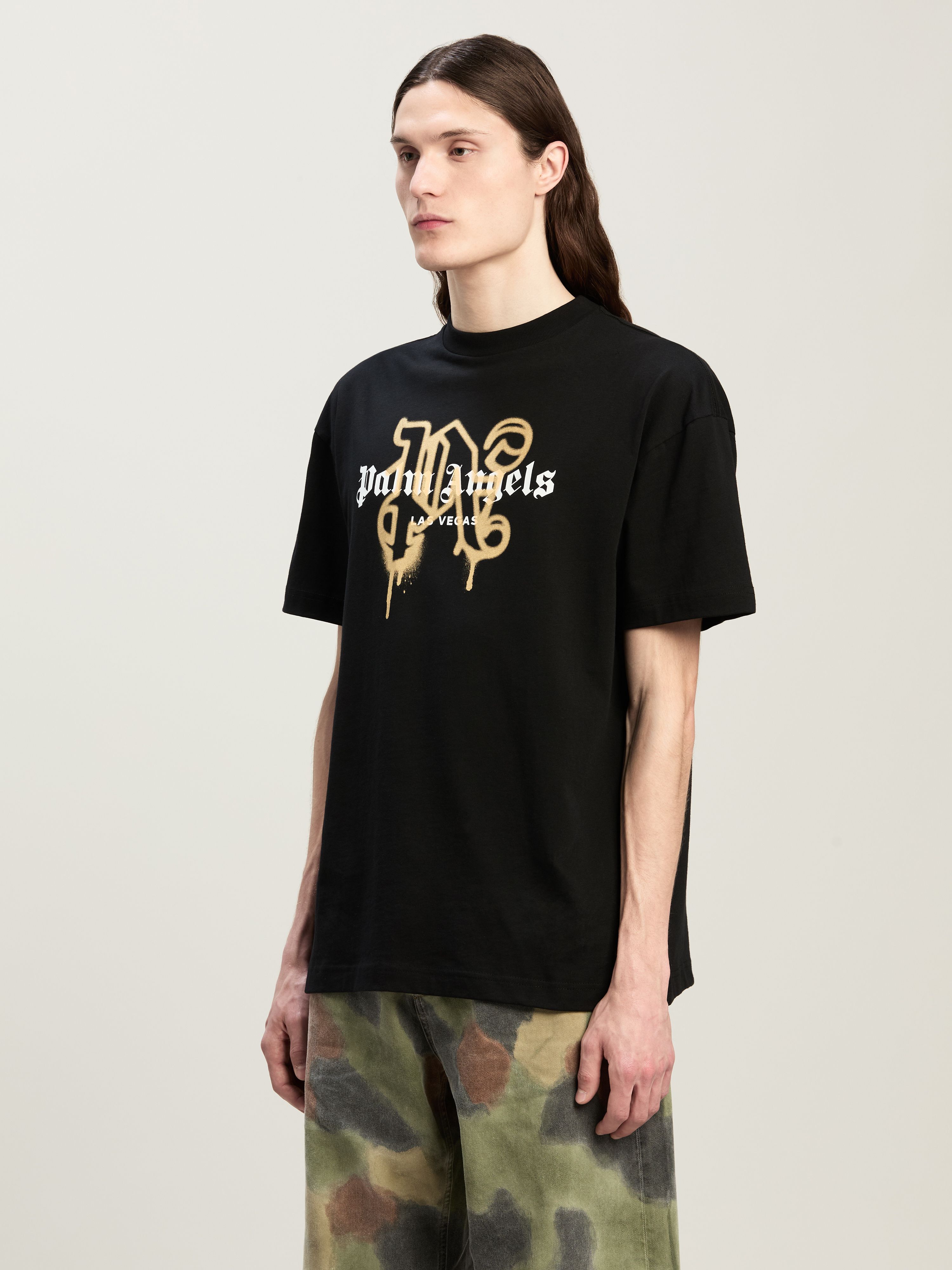 PALM ANGELS Las Vegas Monogram Spray Tee BLACK - GOLD PMAA001C99JER031