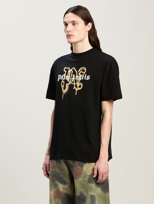 Las Vegas Monogram Spray Tee PALM ANGELS Las Vegas Monogram Spray Tee BLACK - GOLD PMAA001C99JER031