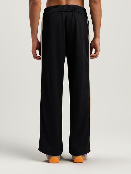 PALM ANGELS Performance Zipup Track Pants BLACK - ORANGE PMCJ04EF25FAB001
