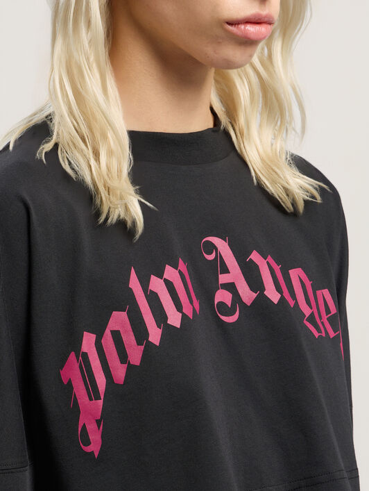 Curved Logo Crop Long Sleeve PALM ANGELS Curved Logo Crop Long Sleeve BLACK - FUCHSIA PWAB023F25JER002