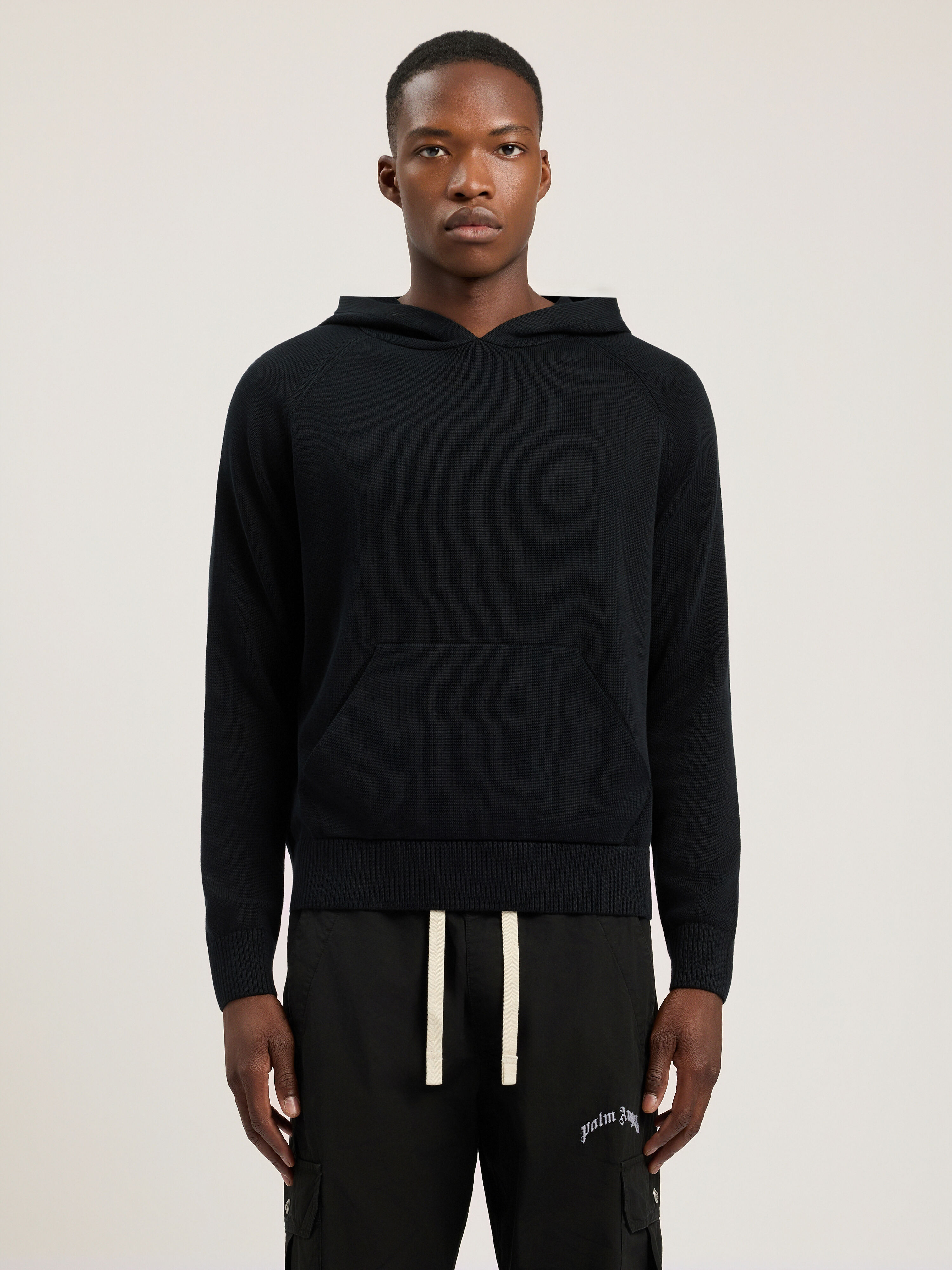 Curved Logo Regular Knit Hoodie PALM ANGELS Curved Logo Regular Knit Hoodie BLACK - OFF WHITE PAMHU001KN001