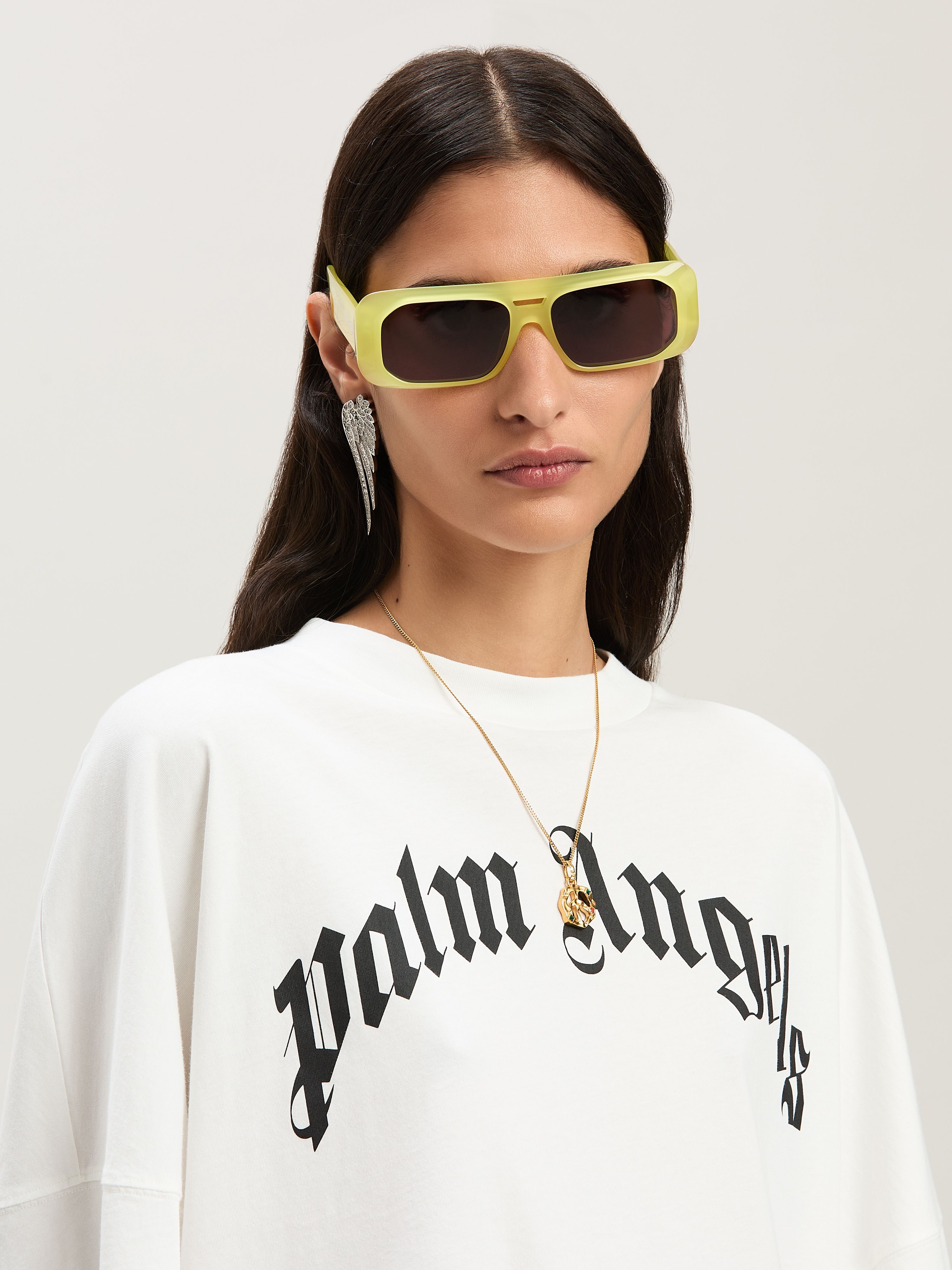PALM ANGELS  Oversize T-Shirt mit geschwungenem Logo OFF WHITE - BLACK PWAA023S25JER001