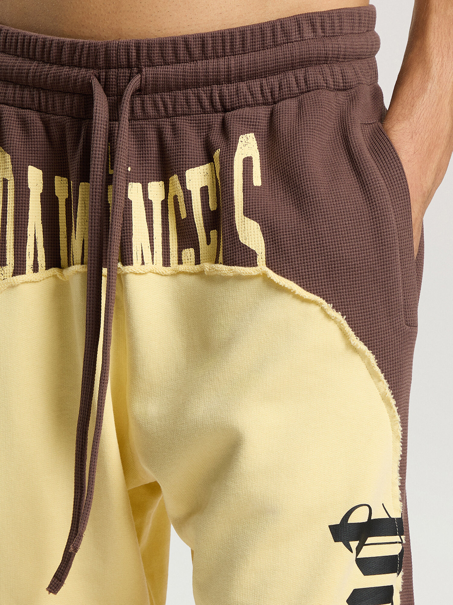 Vintage Logo Loose Sweatpants PALM ANGELS Vintage Logo Loose Sweatpants BROWN - LIGHT YELLOW PAMCH03F26FL01