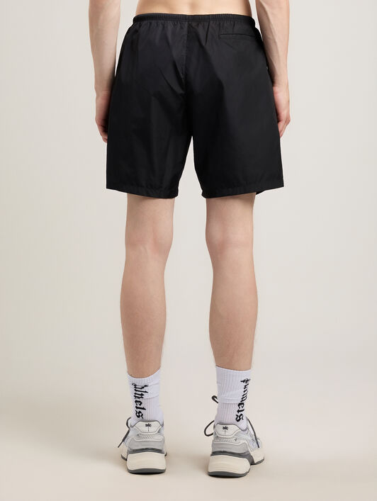 PALM ANGELS Curved Logo Swimshorts BLACK OFF WHITE PMFD018S26FAB001