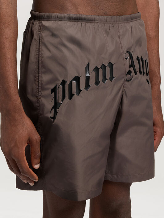 PALM ANGELS Curved Logo Swimshorts BROWN BLACK PMFD018S26FAB001