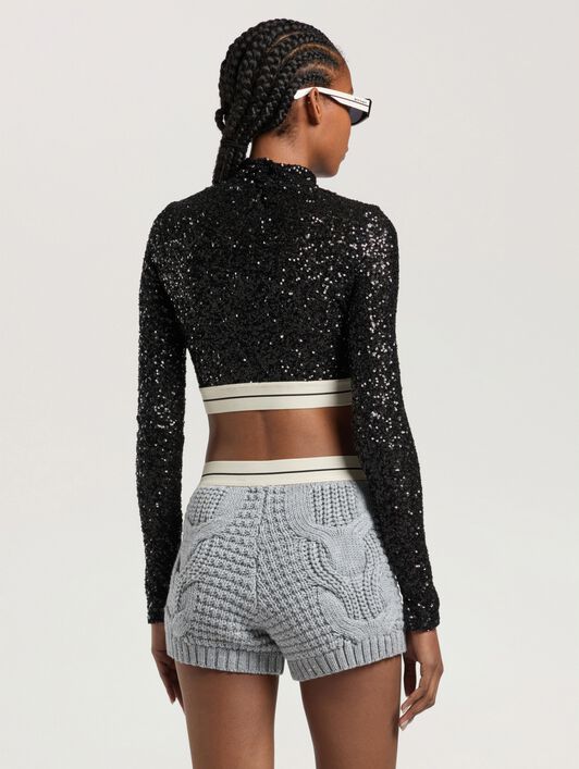 Logo Essential Sequins Top Long Sleeve PALM ANGELS Logo Essential Sequins Top Long Sleeve BLACK - CREAM PAWAF03W26FB01