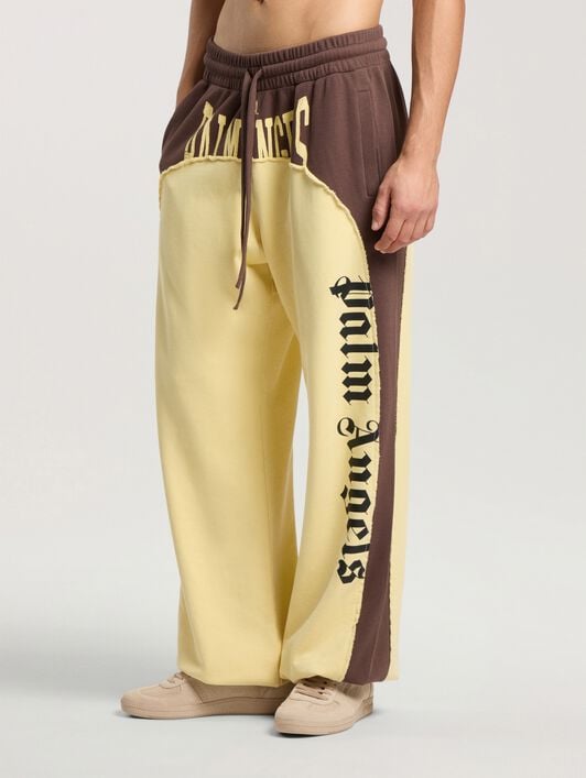 Vintage Logo Loose Sweatpants PALM ANGELS Vintage Logo Loose Sweatpants BROWN - LIGHT YELLOW PAMCH03F26FL01