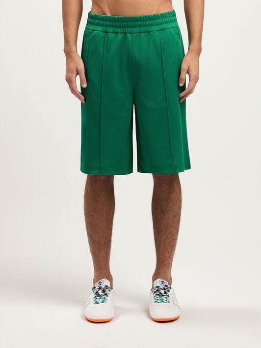 Back Curved Logo Track Shorts PALM ANGELS Back Curved Logo Track Shorts GREEN BLACK PMCL00AS26FAB001