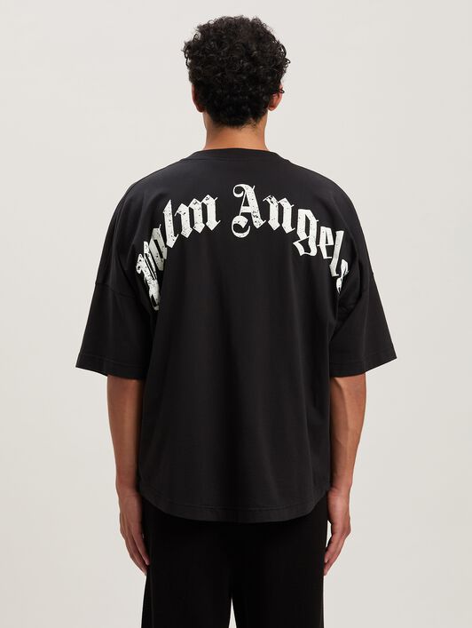 PALM ANGELS Oversize T-Shirt mit geschwungenem Logo BLACK - OFF WHITE PMAA002S25JER001
