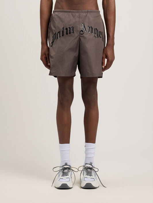 PALM ANGELS Curved Logo Swimshorts BROWN BLACK PMFD018S26FAB001