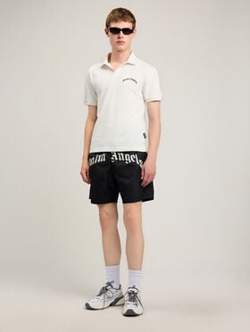 Curved Logo Swimshorts PALM ANGELS Curved Logo Swimshorts BLACK - OFF WHITE PAMFD001FB001