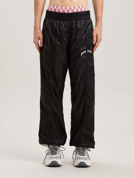 PALM ANGELS  Nylon Track Pants Curved Logo BLACK - GREY PMCA179S25FAB001
