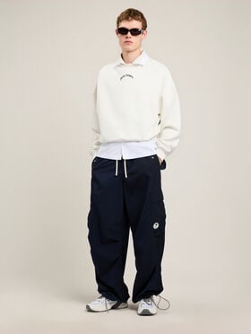 Back Curved Logo Loose Sweatshirt PALM ANGELS Back Curved Logo Loose Sweatshirt OFF WHITE BLACK PMBA08JS26FLE004