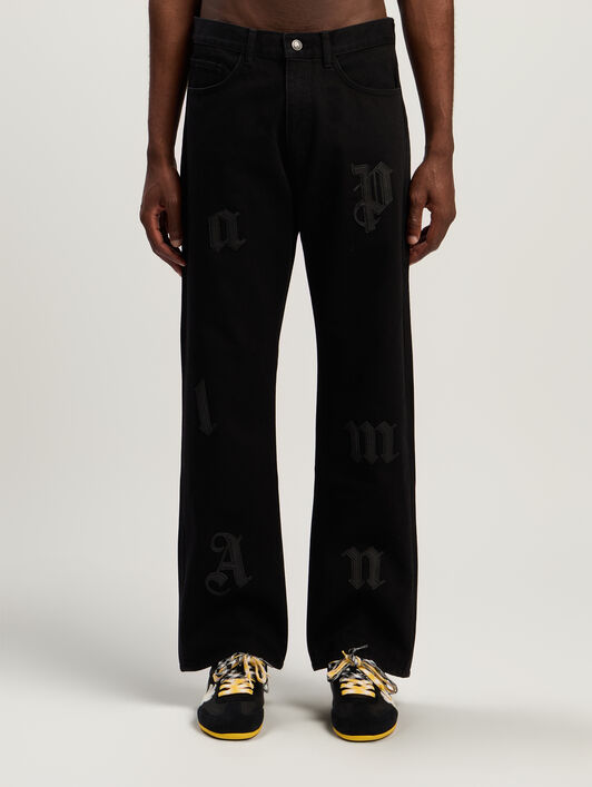Logo Patch Straight Jeans PALM ANGELS Logo Patch Straight Jeans BLACK - BLACK PMYA041F25DEN001