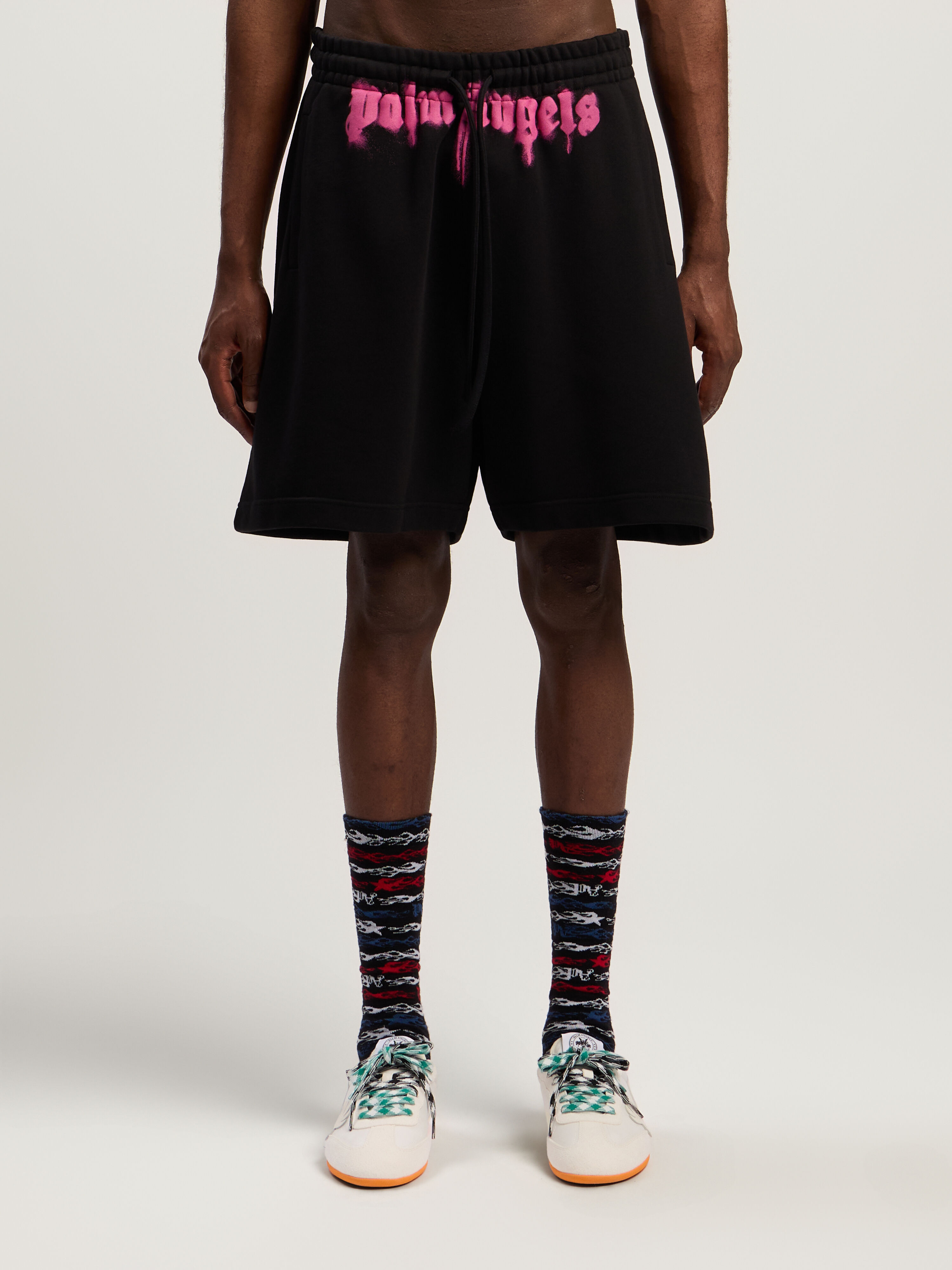 Sprayed Logo Sweatshorts in BLACK - FUCHSIA for Men | Palm Angels®