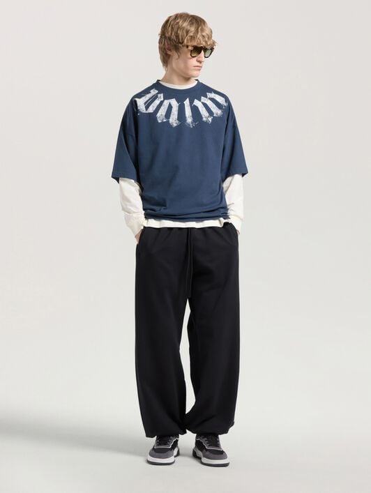 Big Neck Logo Loose Tee PALM ANGELS Big Neck Logo Loose Tee NAVY BLUE - OFF WHITE PAMAA03F26JR01