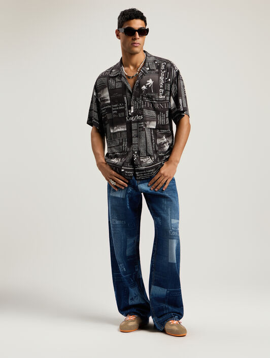 News Print Loose Denim Pants PALM ANGELS News Print Loose Denim Pants MEDIUM BLUE - DUSTY BLUE PMYA049F25DEN002