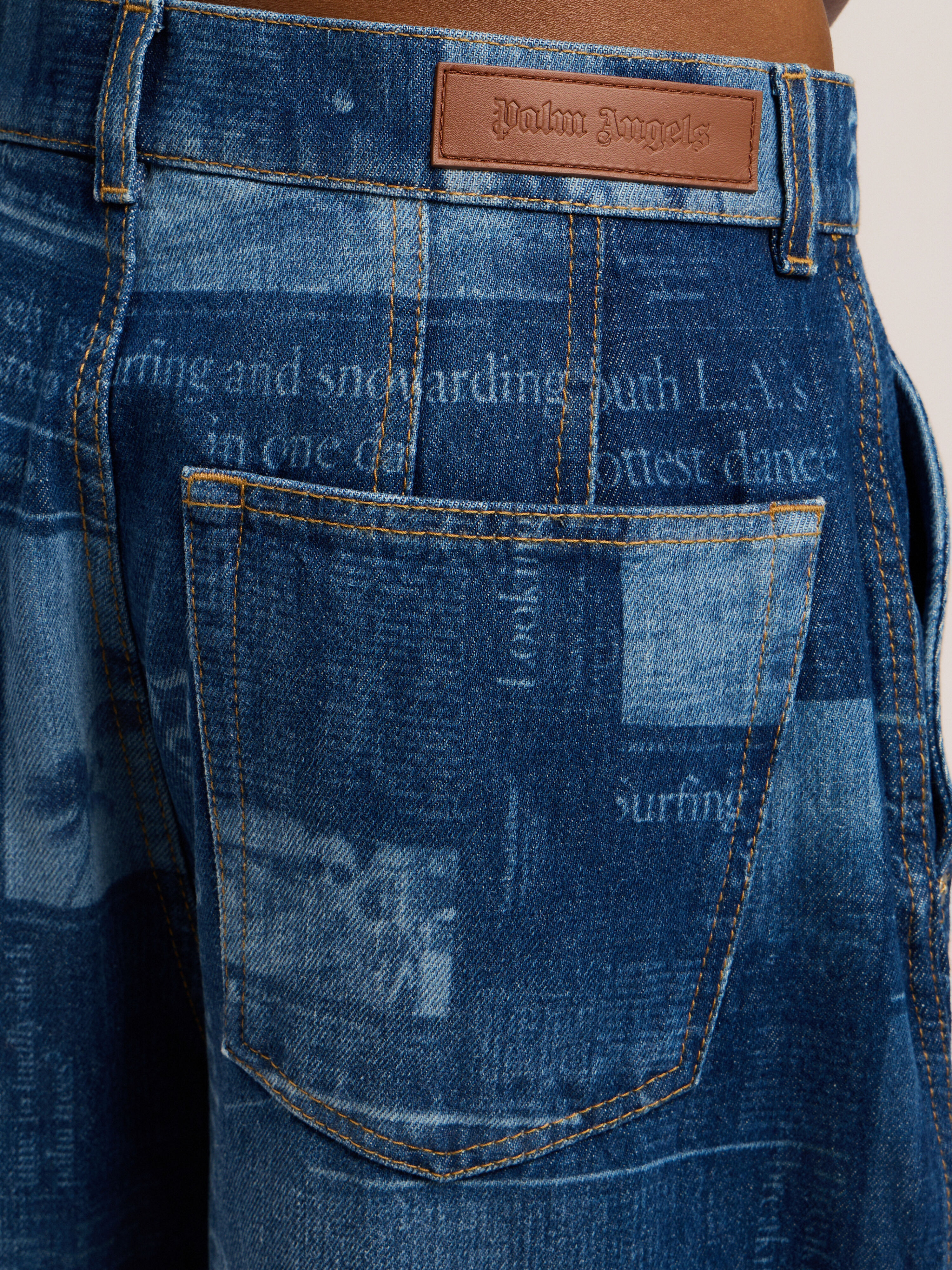 PALM ANGELS Newsprint Baggy Denim Pants MEDIUM BLUE - DUSTY BLUE PWYB040F25DEN001