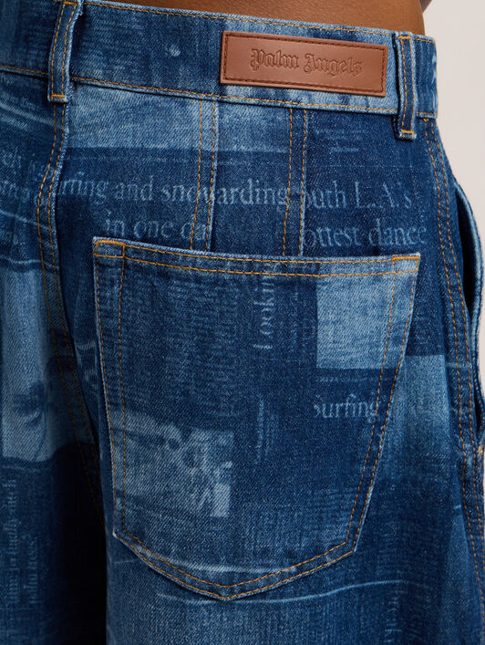 Newsprint Baggy Denim Pants PALM ANGELS Newsprint Baggy Denim Pants MEDIUM BLUE - DUSTY BLUE PWYB040F25DEN001
