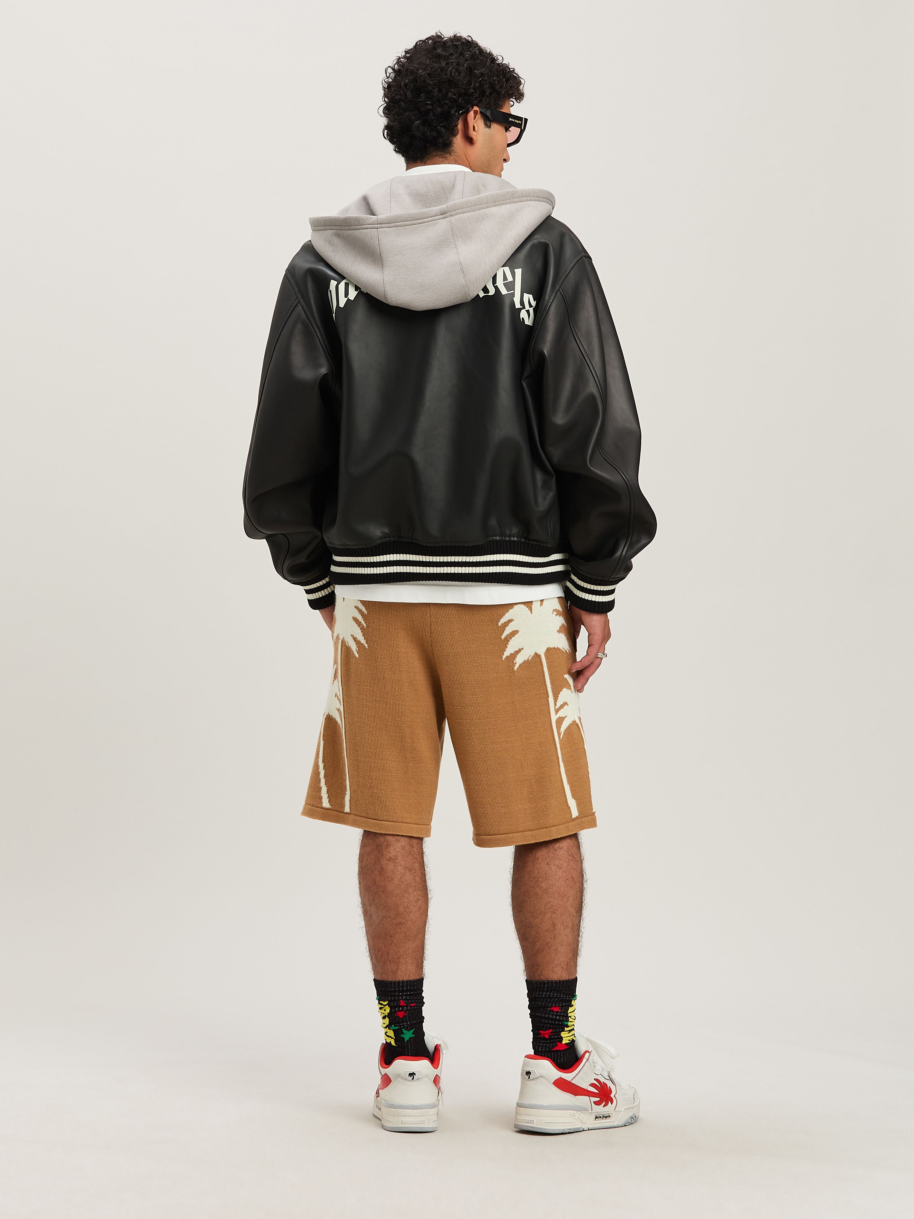 PALM ANGELS  Leder-Bomberjacke mit geschwungenem Logo BLACK - OFF WHITE PMJA043S25LEA001