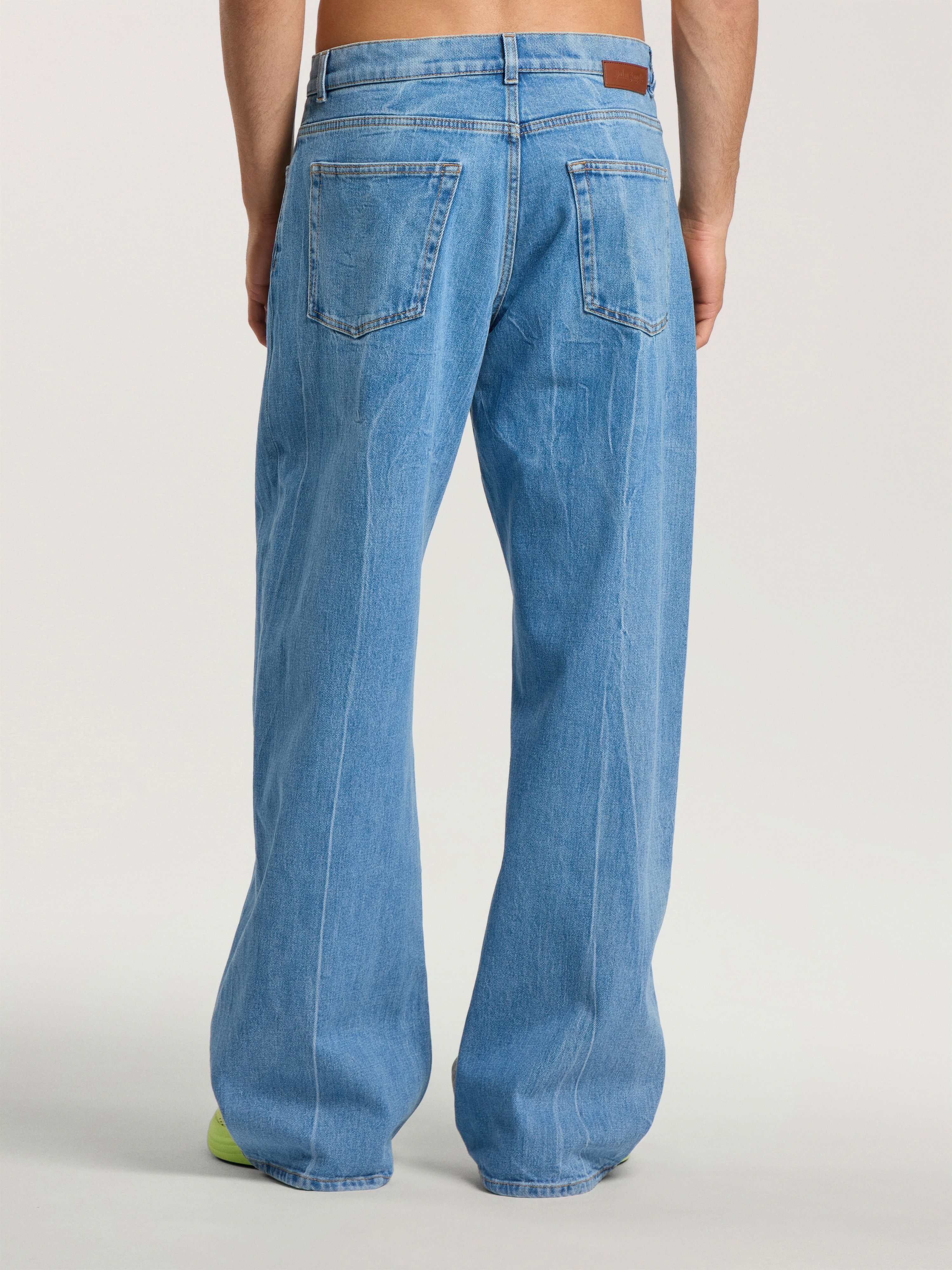 Splitted Curved Logo Loose Jeans PALM ANGELS Splitted Curved Logo Loose Jeans LIGHT BLUE - LIGHT BLUE PAMYA01F26DN03