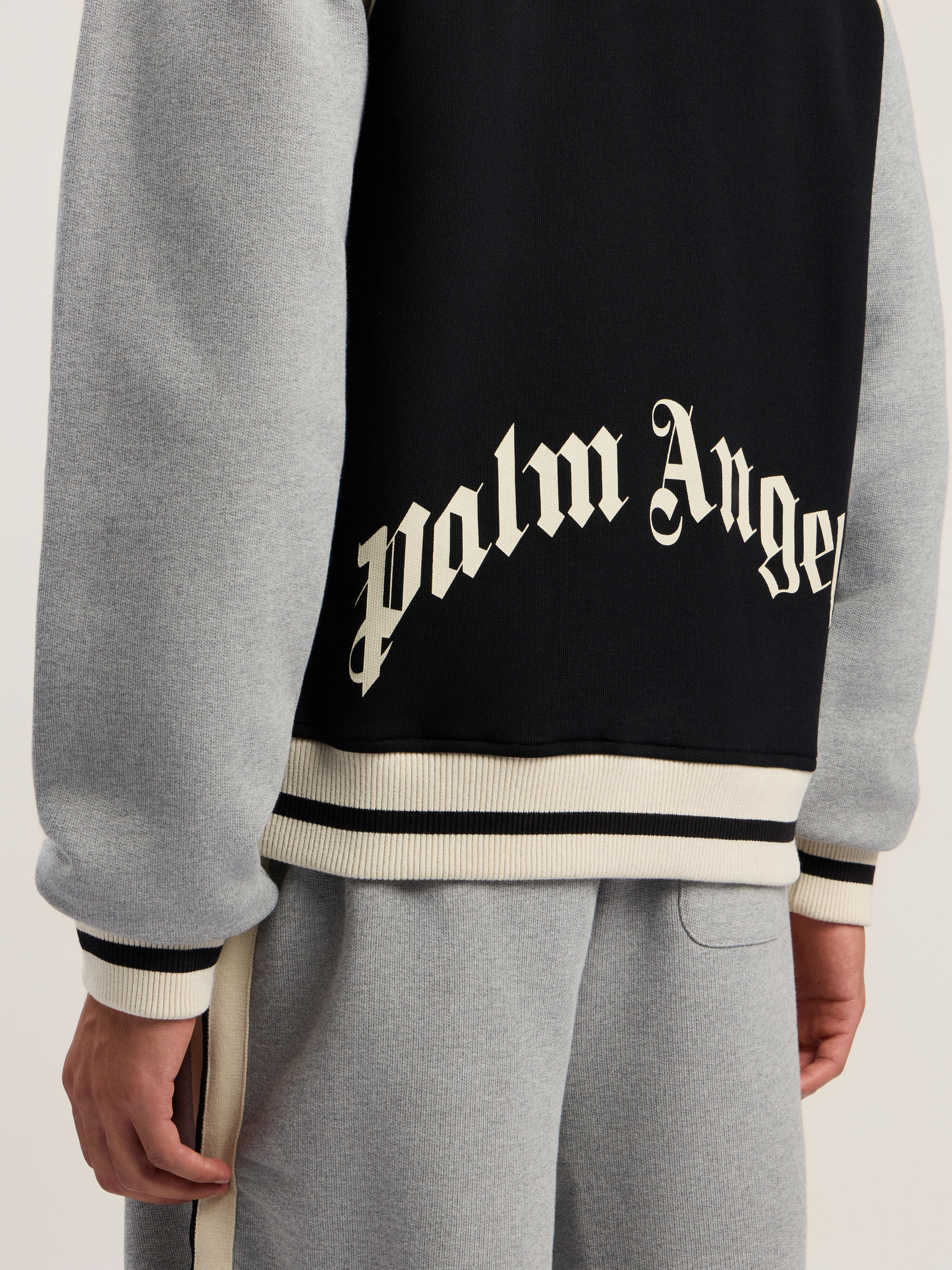 PALM ANGELS Curved Logo Track Varsity BLACK - GREY MELANGE PMEK013F25FLE001