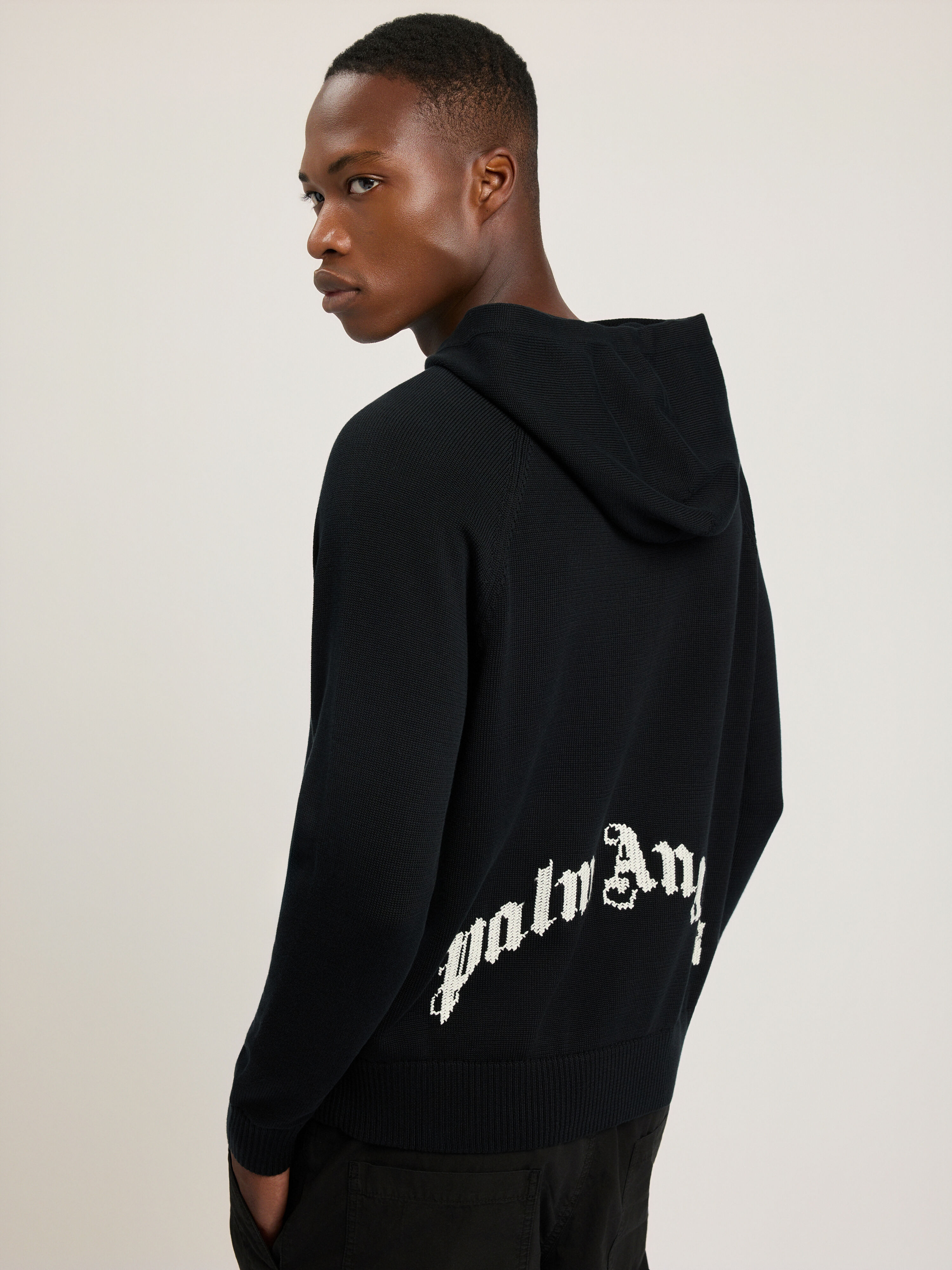 Curved Logo Regular Knit Hoodie PALM ANGELS Curved Logo Regular Knit Hoodie BLACK - OFF WHITE PAMHU001KN001