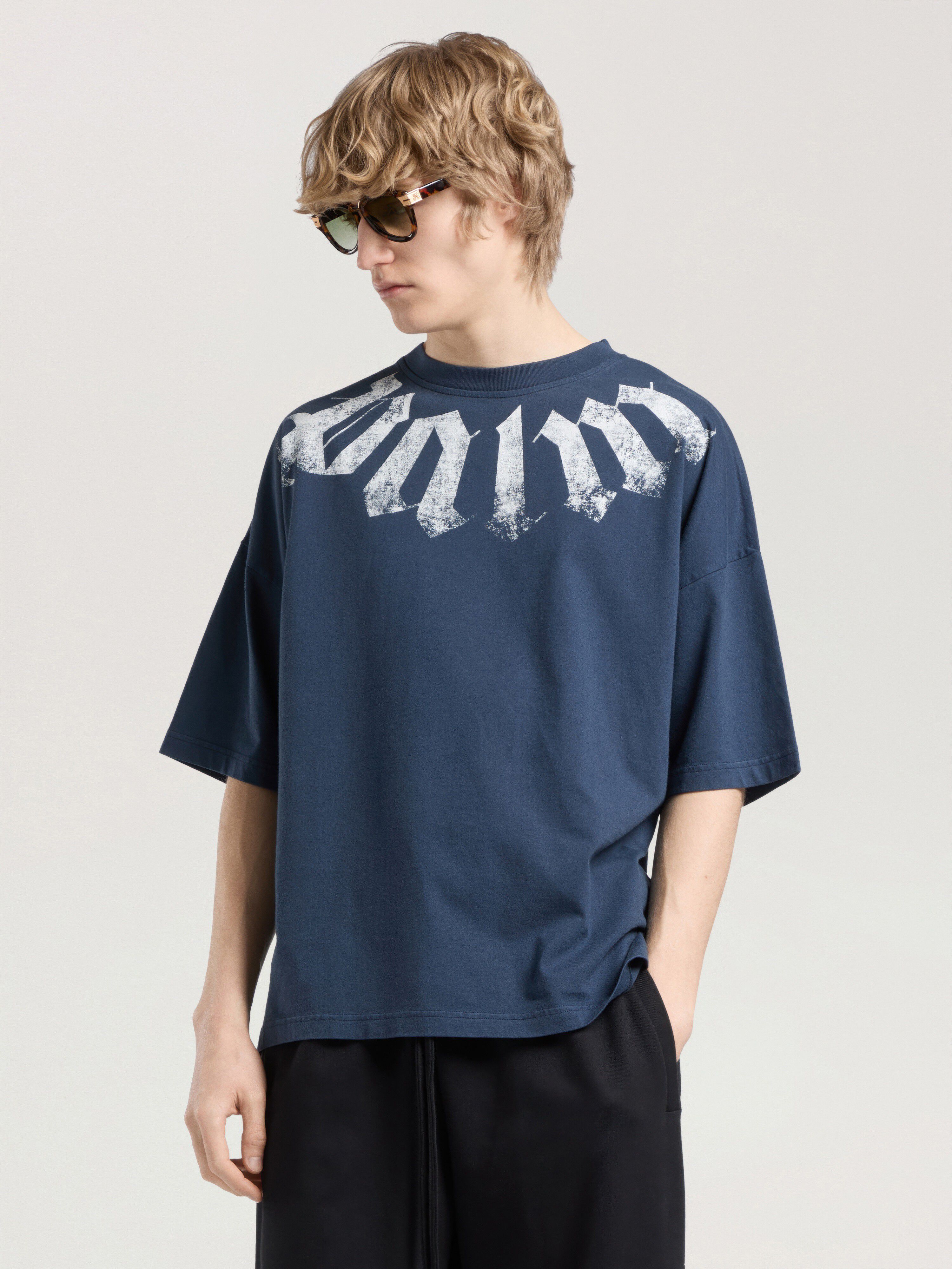 Big Neck Logo Loose Tee PALM ANGELS Big Neck Logo Loose Tee NAVY BLUE - OFF WHITE PAMAA03F26JR01