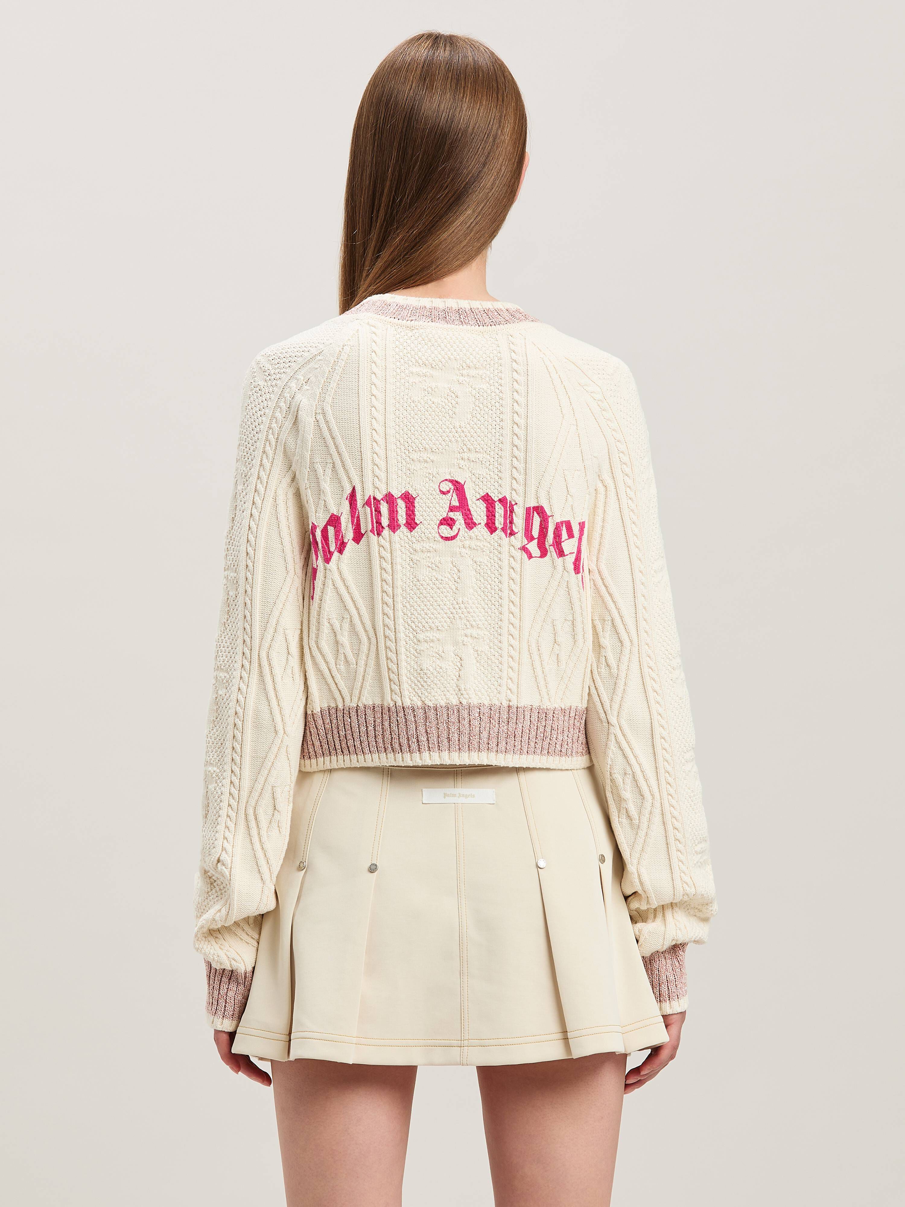 PALM ANGELS  Curved logo sweater OFF WHITE - FUCHSIA PWHE075S25KNI001