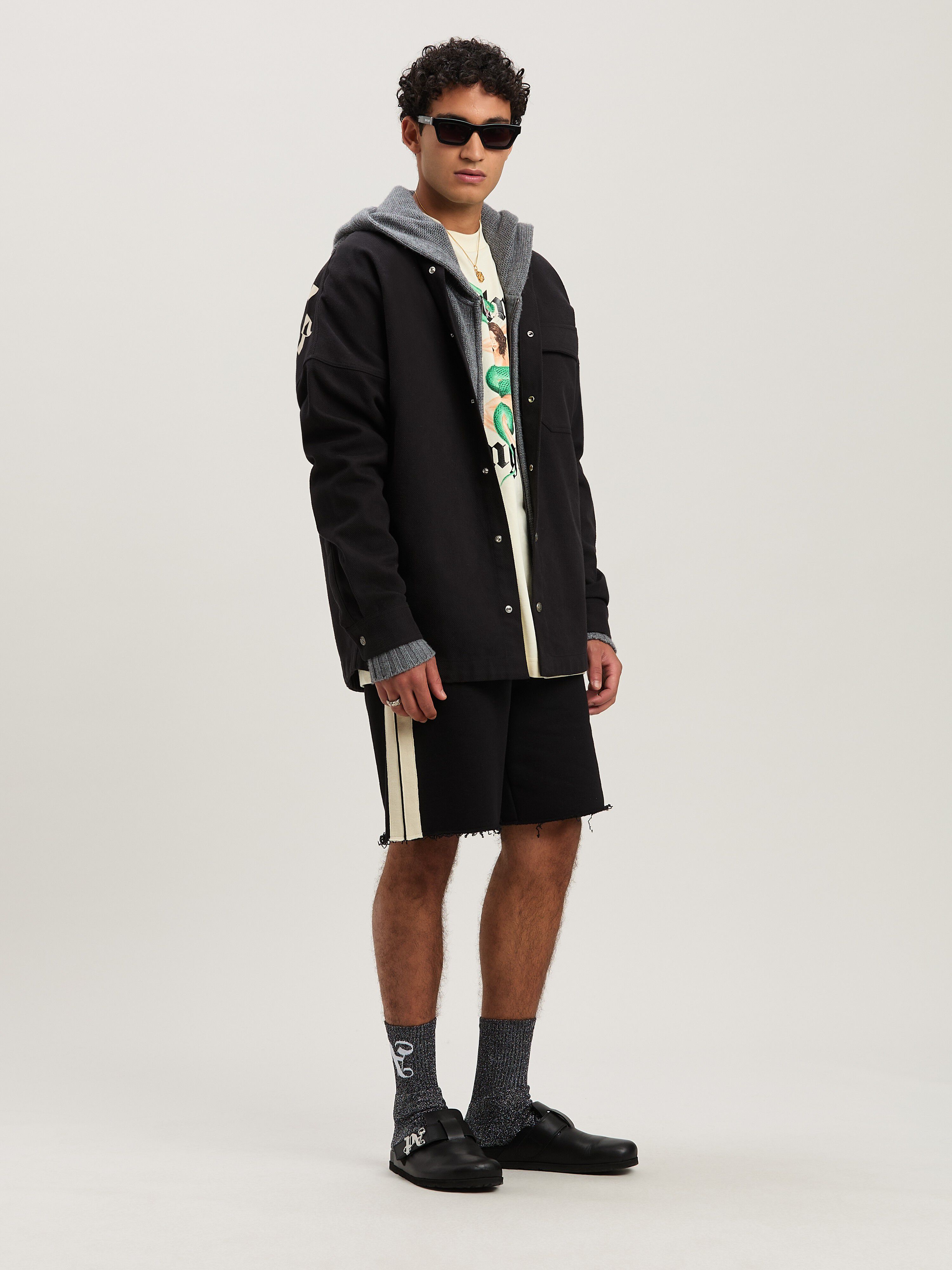 PALM ANGELS  Curved Logo knit hoodie GREY MELANGE - OFF WHITE PMHU023S25KNI001