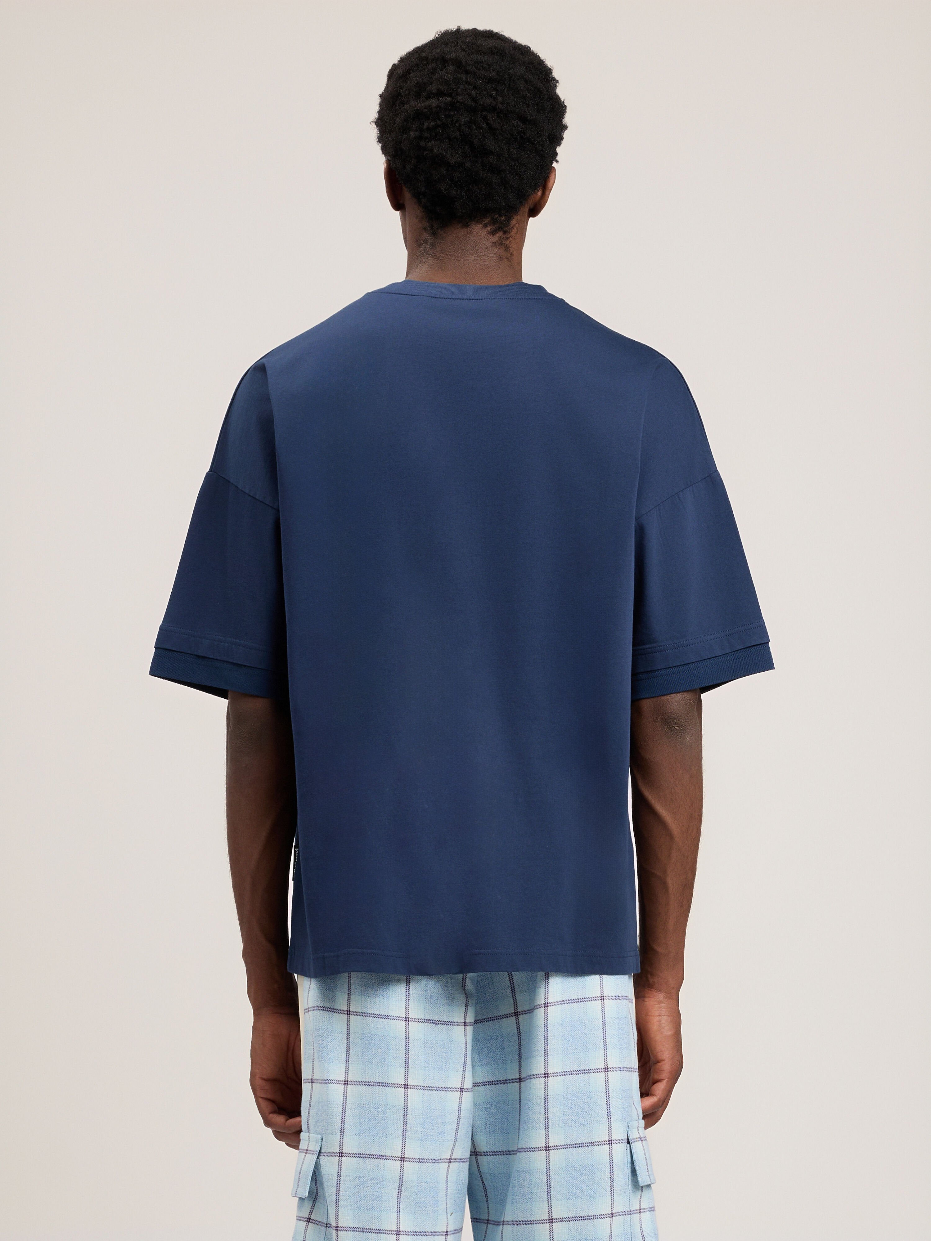 Curved Logo Loose Double T-Shirt PALM ANGELS Curved Logo Loose Double T-Shirt NAVY BLUE NAVY BLUE PMAA10QS26JER001