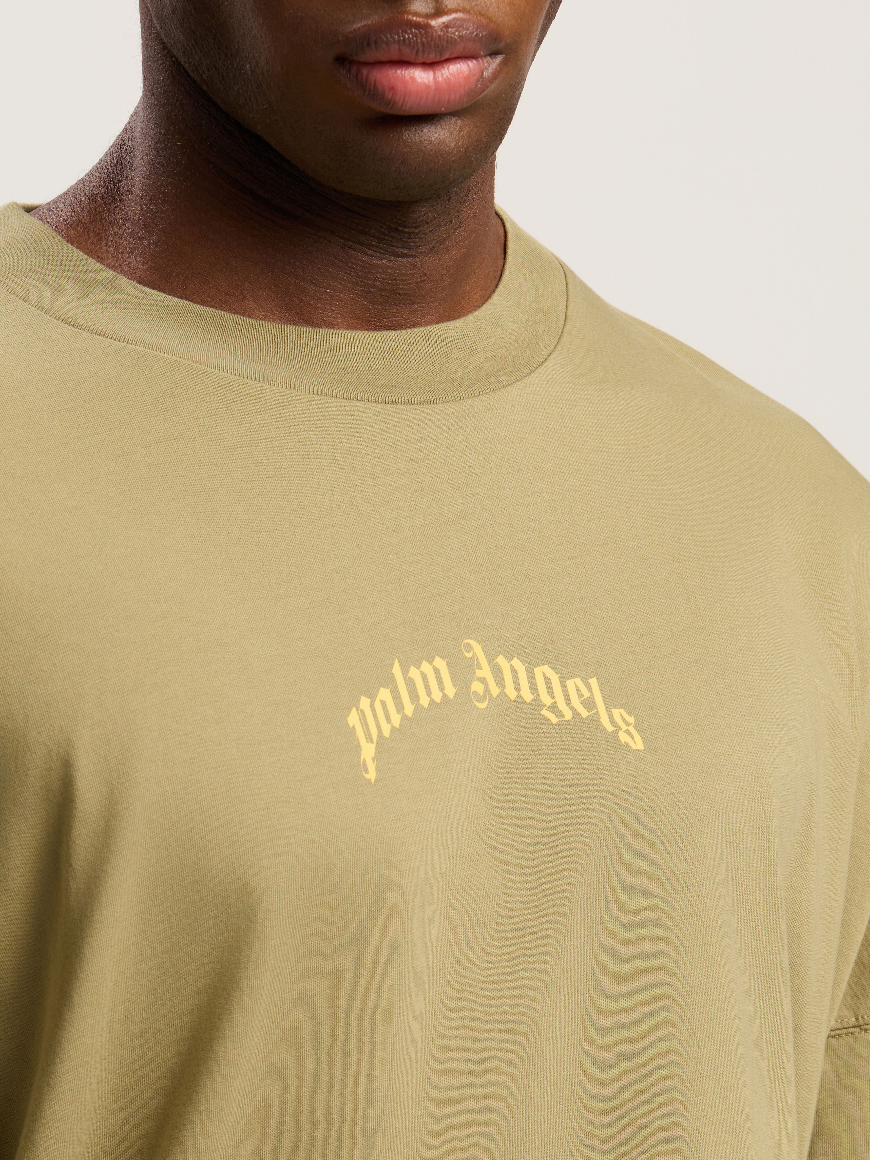 PALM ANGELS Curved Logo Long Sleeve T-Shirt ARMY GREEN - YELLOW PMAB059F25JER001