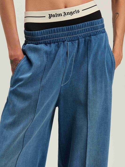 PALM ANGELS  Jogginghose mit Palme INDIGO BLUE - OFF WHITE PWCH024S25FAB001