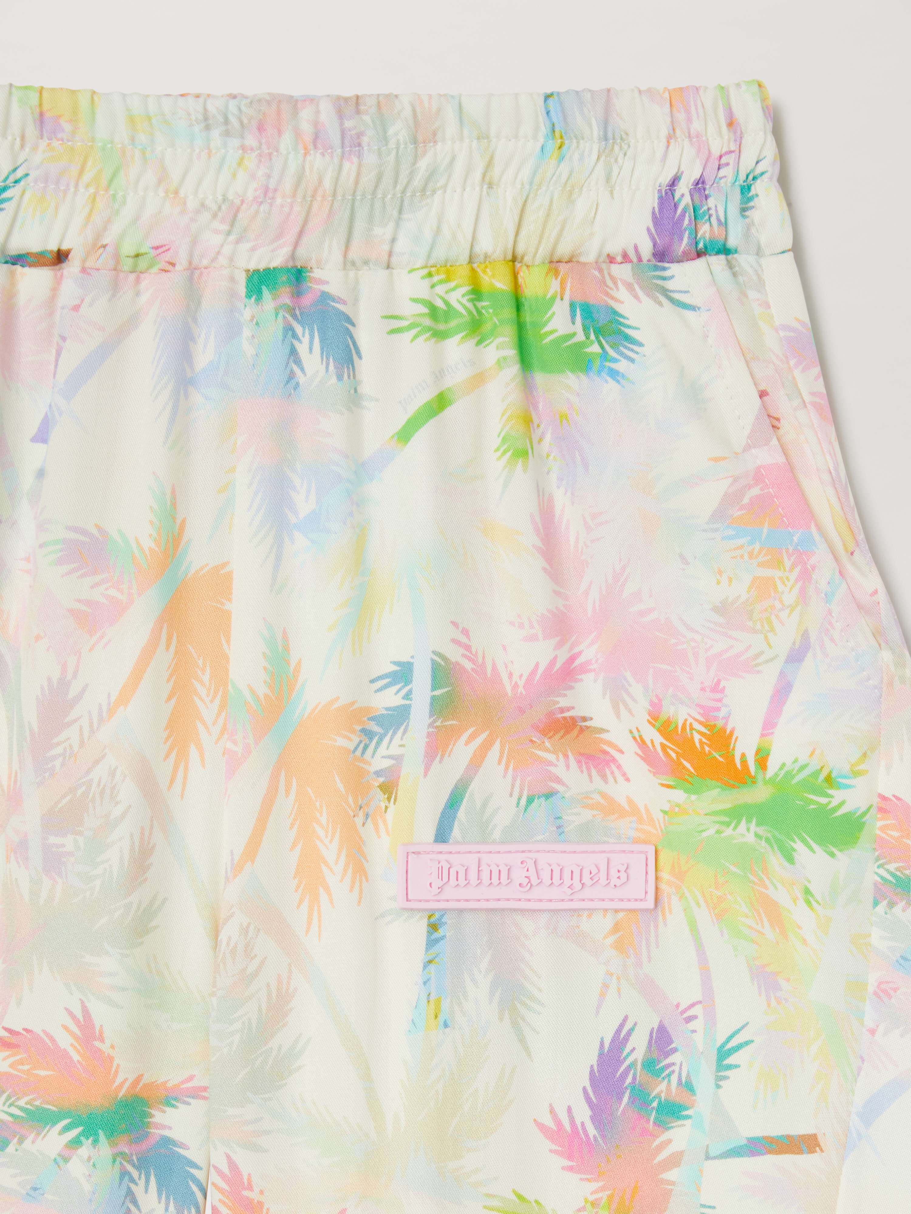 PALM ANGELS  All over palm print pants BUTTER ROSE PINK PGCA015S25FAB001