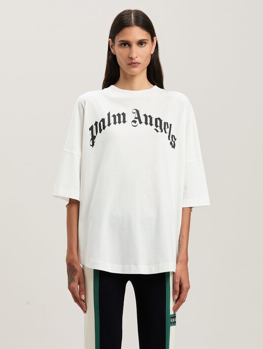 PALM ANGELS  Oversize T-Shirt mit geschwungenem Logo OFF WHITE - BLACK PWAA023S25JER001