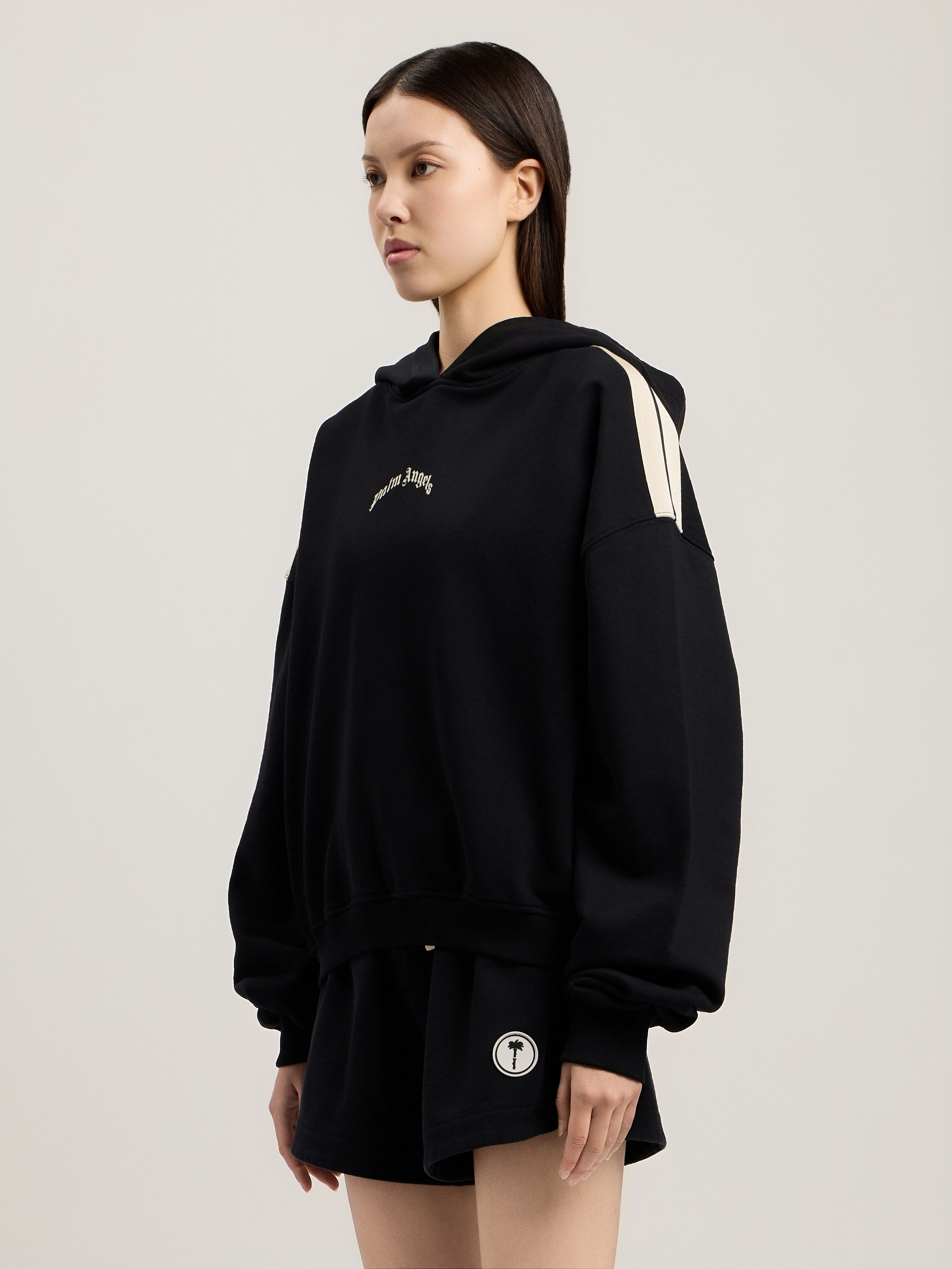 Curved Logo Loose Crop Hoodie in BLACK TOFU for Women | Palm Angels®